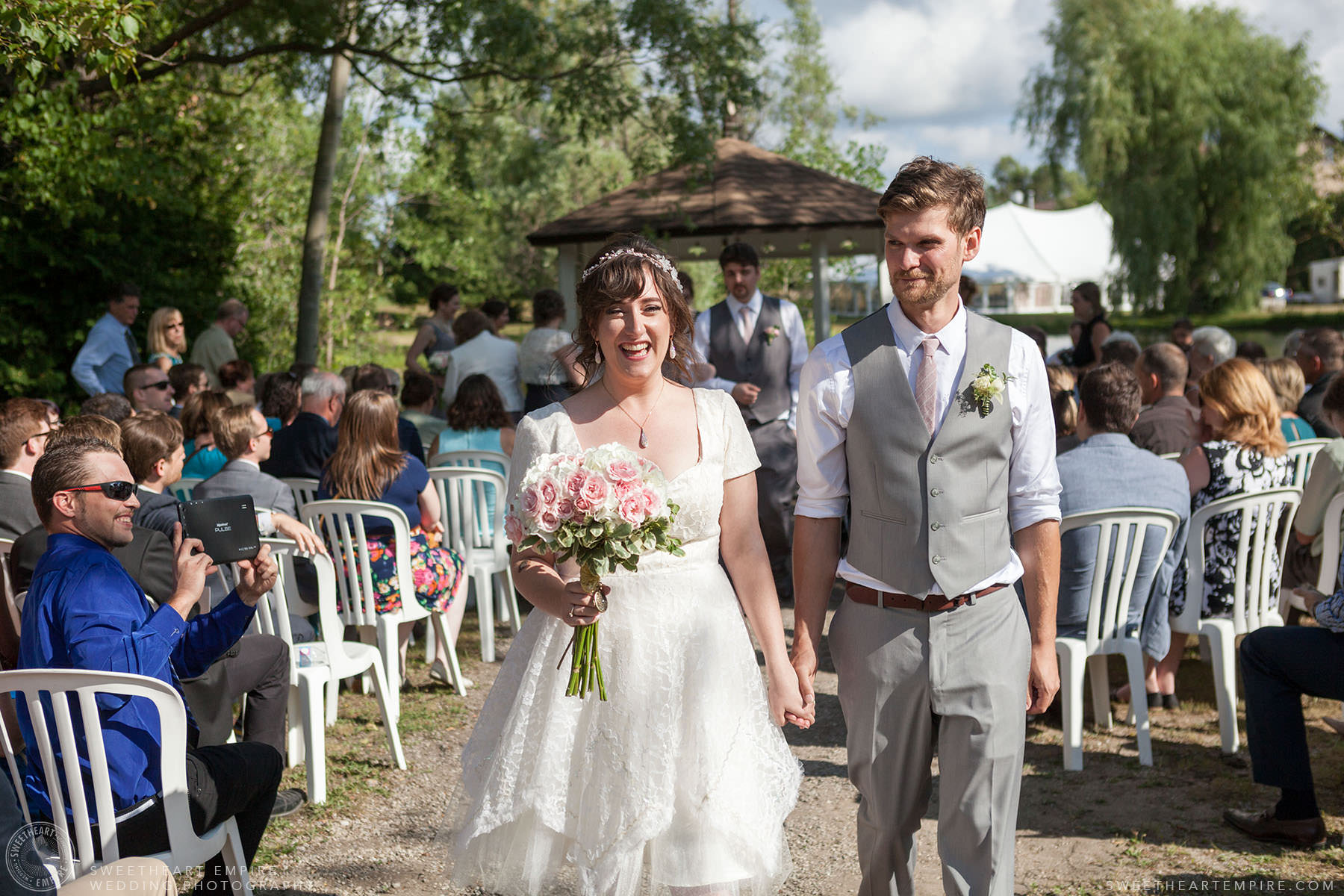 Bride and groom walking down the aisle after wedding ceremony; Aberfoyle Mill Wedding