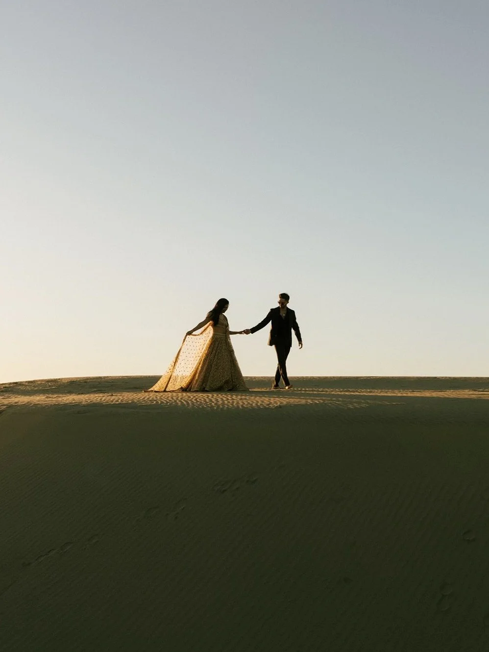 One month until I get to capture these two&rsquo;s beautiful wedding day &mdash; how we are going to top their epic sand dunes engagement session&hellip;well, stay tuned. ⏳
.
.
.
.
#sanddunesengagement #destinationwedding #destinationweddingphotograp