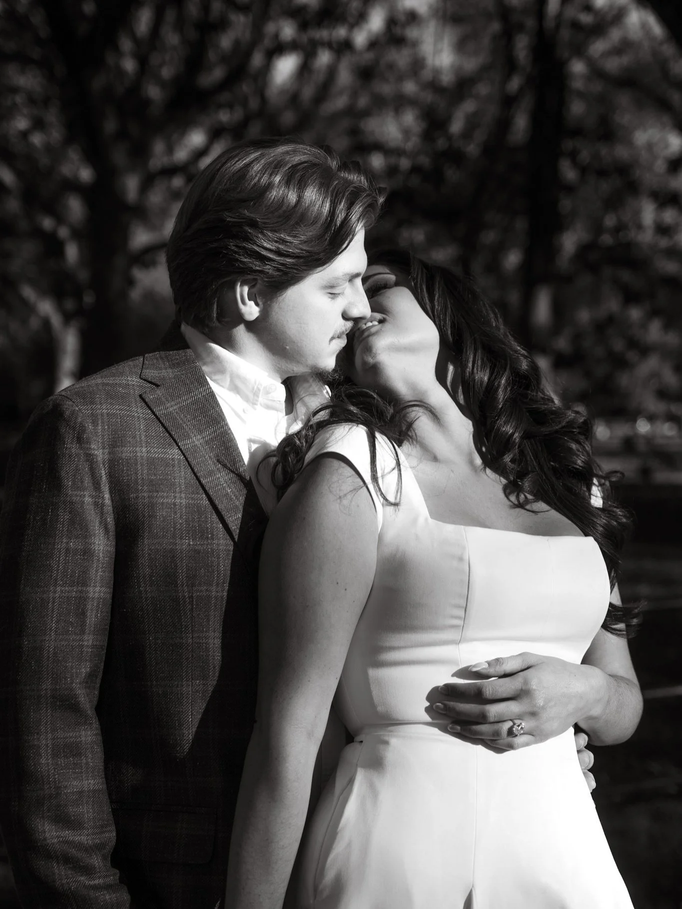 Emma &amp; Tanner in Central Park, on a crisp fall day that felt like it was made just for them. 
They flew to New York for engagement photos and wedding dress shopping&mdash;turning this trip into a memorable celebration of this special time in life