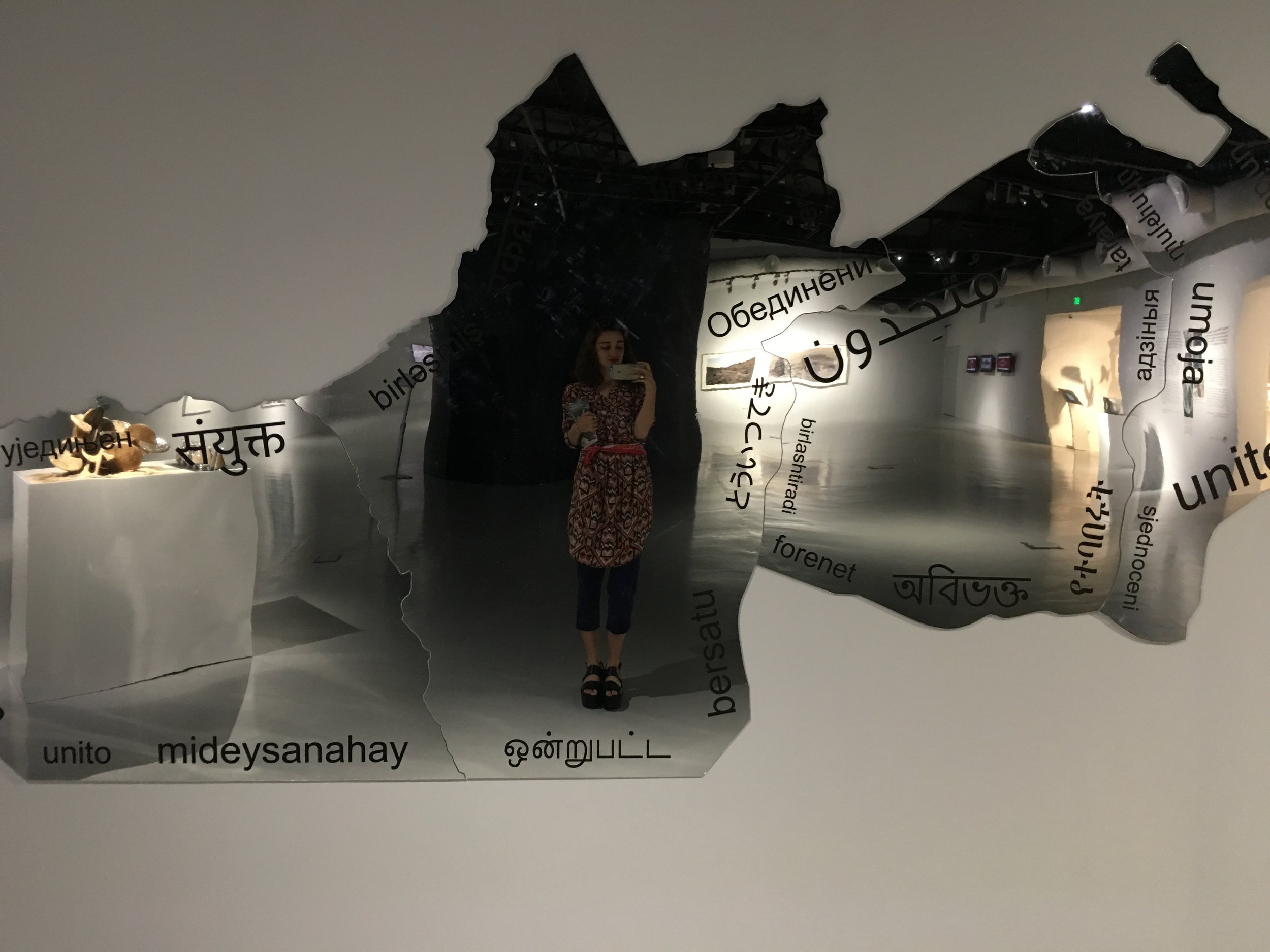 Amna Al Dabbagh, United, 2016, acrylic mirror and printed lettering. Courtesy of the artist. Part of ADMAF collection
