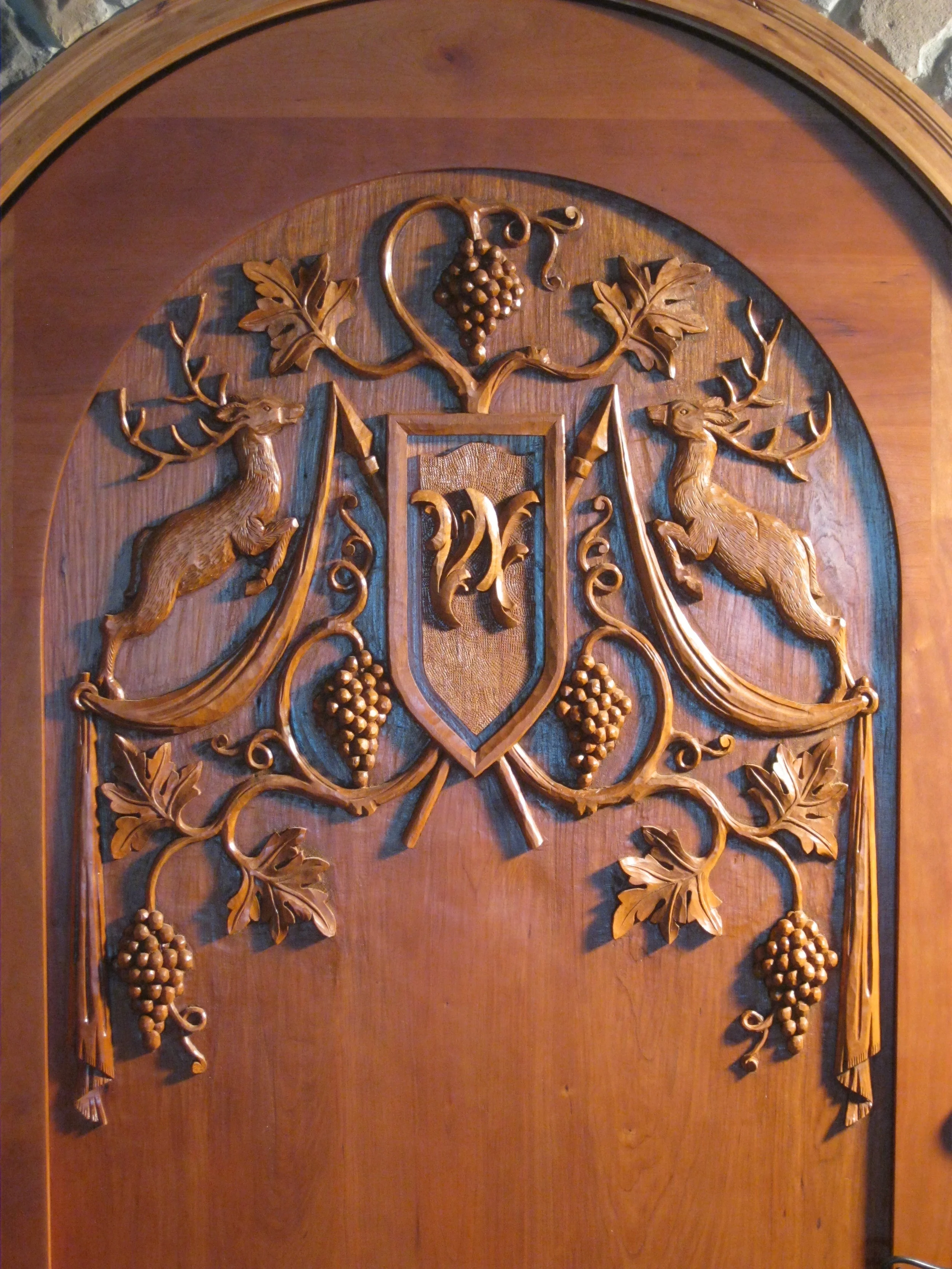 custom hand carved wine cellar wood doors — Erik Wyckoff Woodcarver
