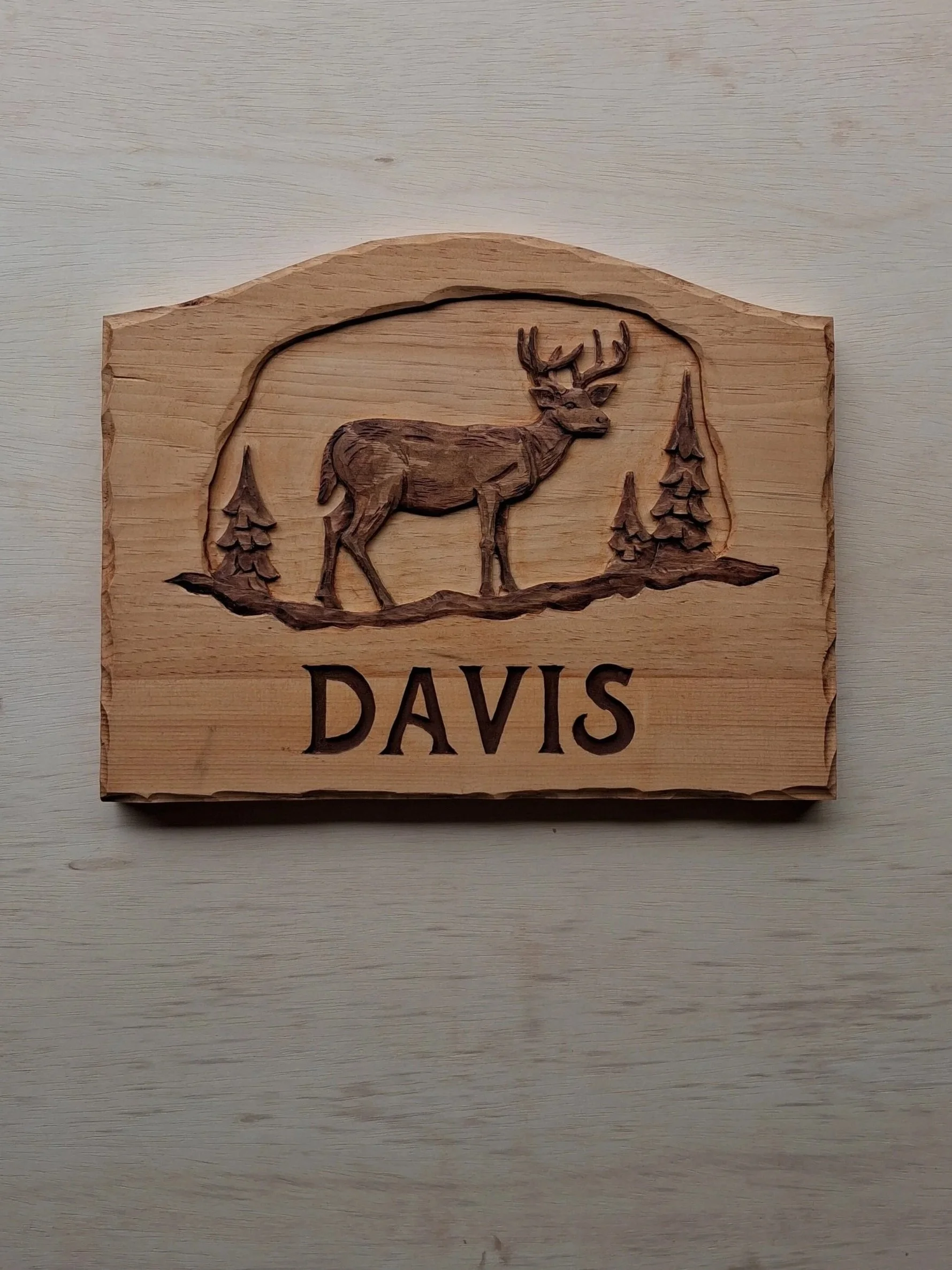 A woodland cabin sign.