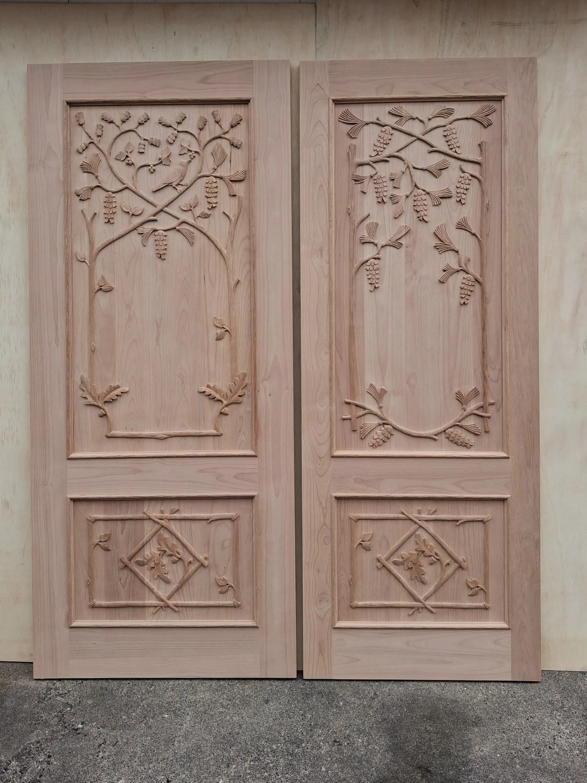 Carved doors inspired by Black Forest furniture.