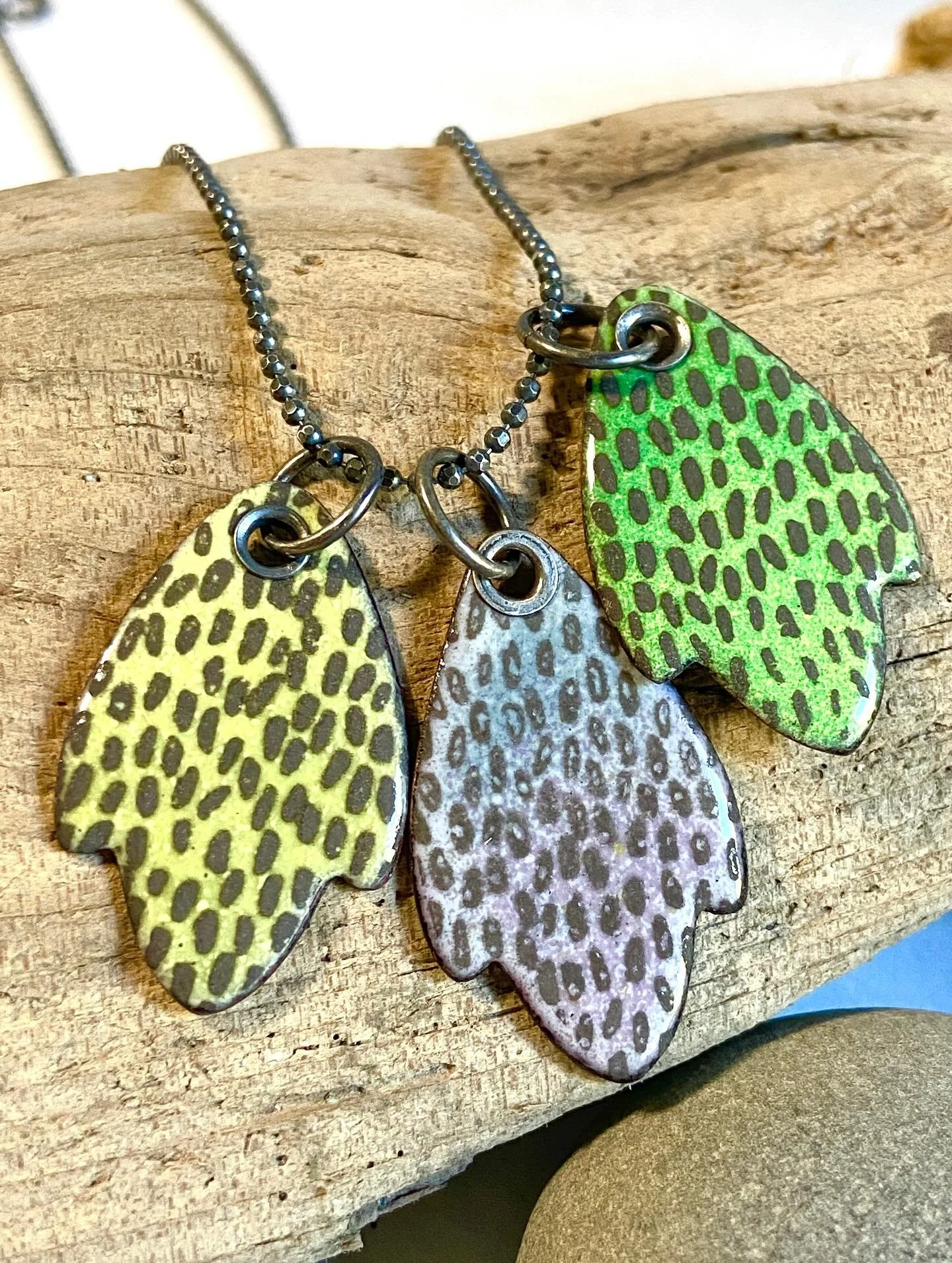 Charms to make your jewelry a creation all your own - pair enameled shapes with rosecut gemstones, silver and copper shapes that speak to you.
