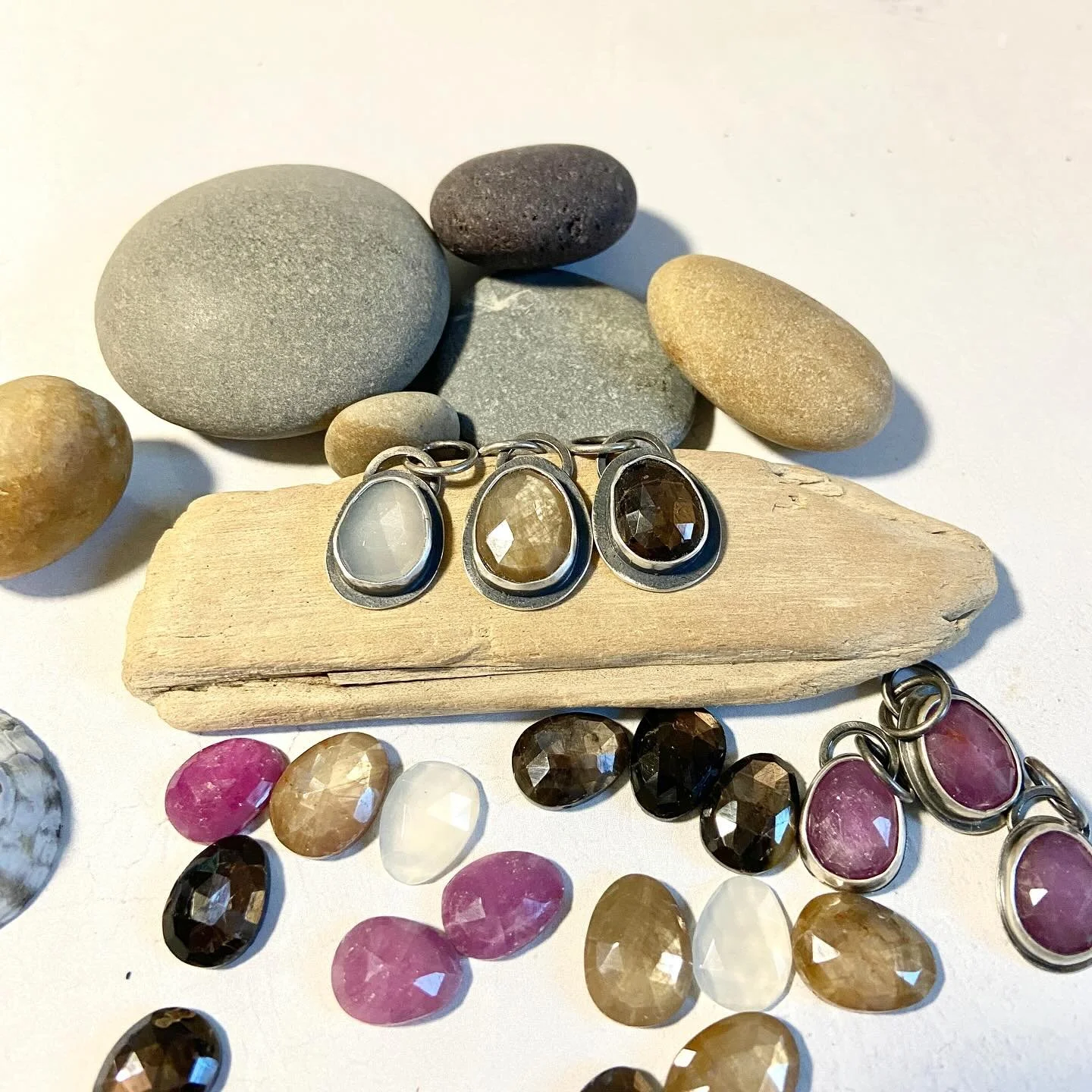 I&rsquo;m slowly working on making things I&rsquo;ve recently added to my website. Here are three gemstone charms ~ moonstone, golden sapphire and chocolate sapphire. I really like the muted combo. How about you?