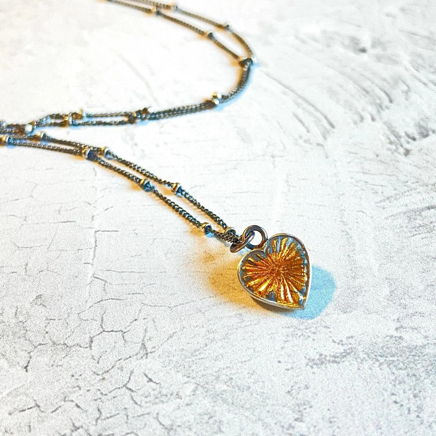 It feels weird posting jewelry while much of the country is under siege. It&rsquo;s all I can do to add a little sparkle to the world. Making brings me peace, joy and hope. I hope this inspires you. ❤️ 

#heartandsoul #heartjewelry #heartbroken #arti