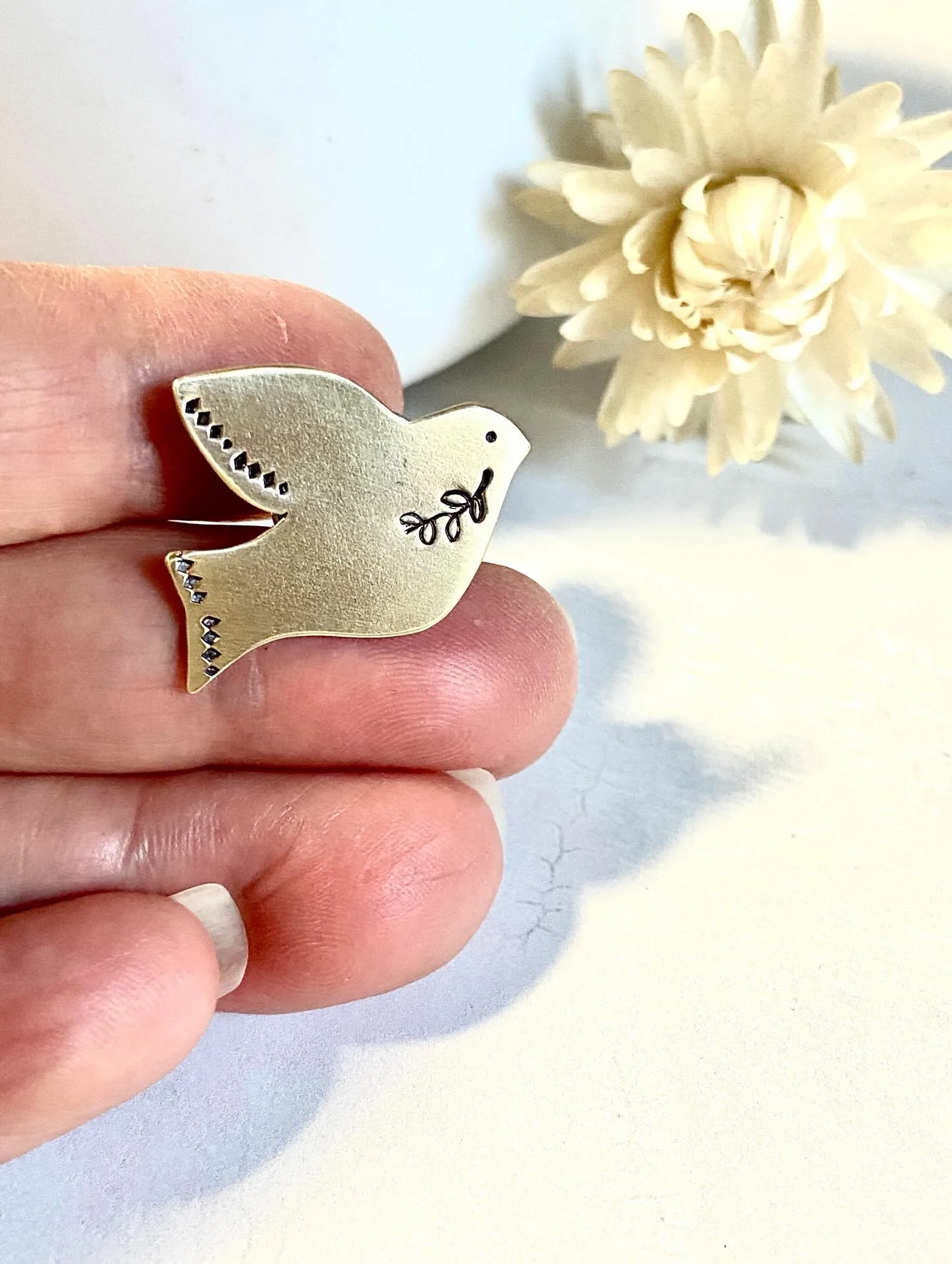 Hope is the thing with feathers that perches in the soul ~ Emily Dickinson 

#peaceonearth #spreadalittlelove #birdjewelry #handcraftedjewelry #brooch