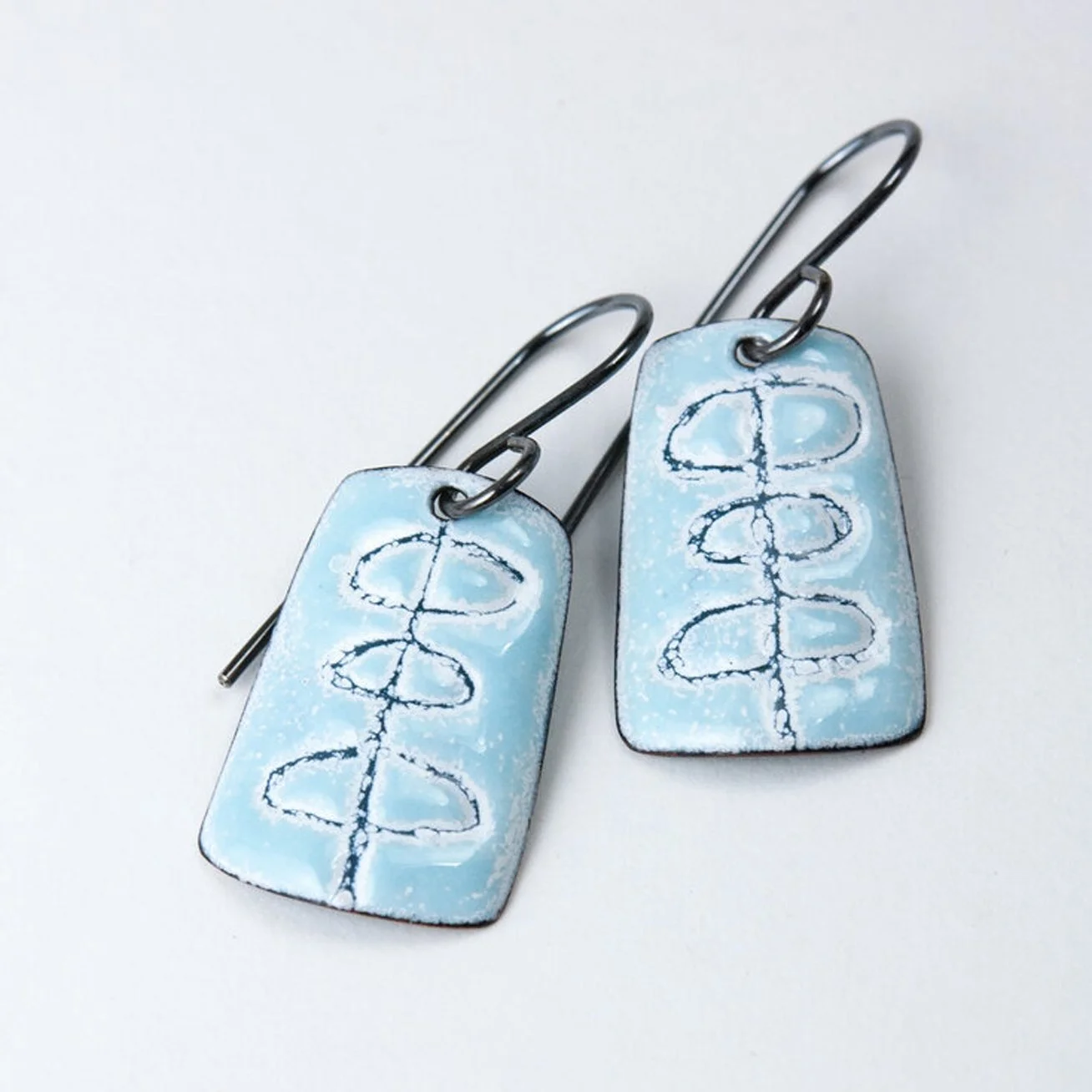 Blue atomic flower enamel earrings.jpg