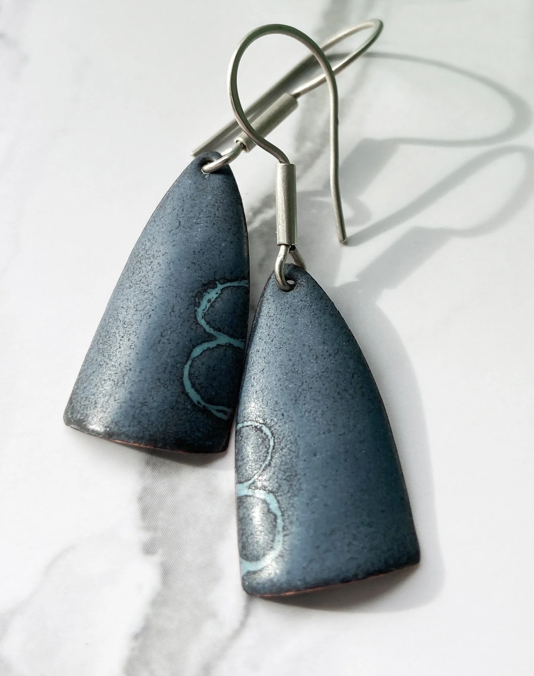 Lobster Buoy Earrings in two tones of blue made with enameled copper using the advanced sgraffito enamel technique