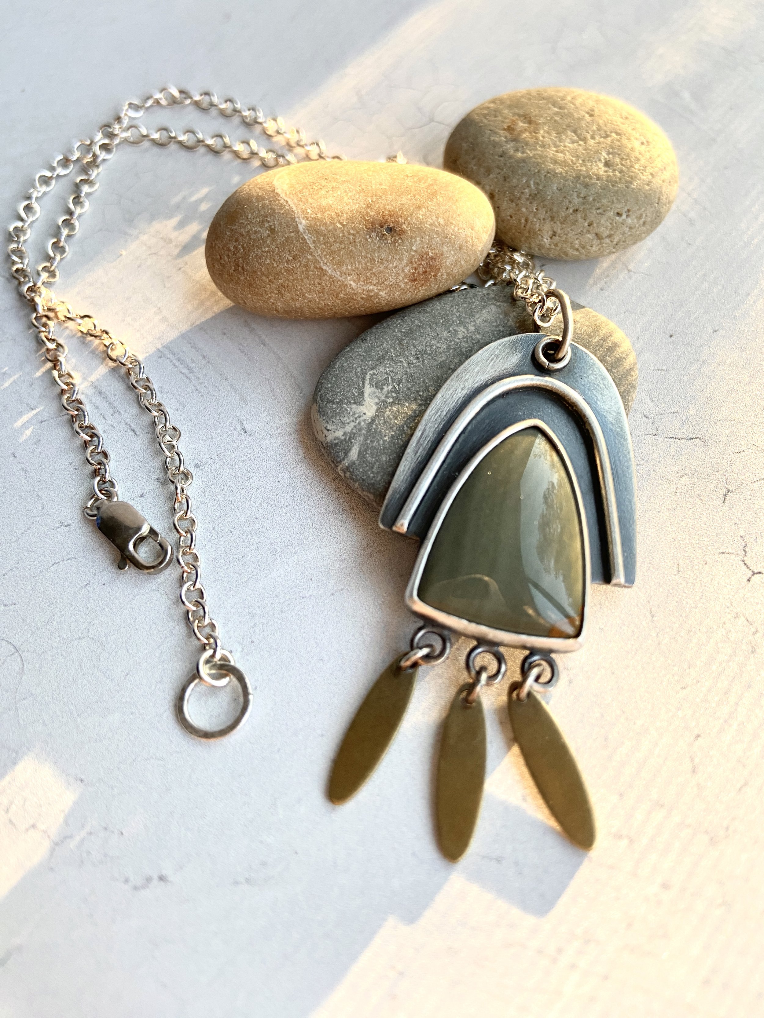 Necklace featuring Sterling Silver Rainbow Arch over Polychrome Jasper with brass dangles on an oxidized sterling silver chain