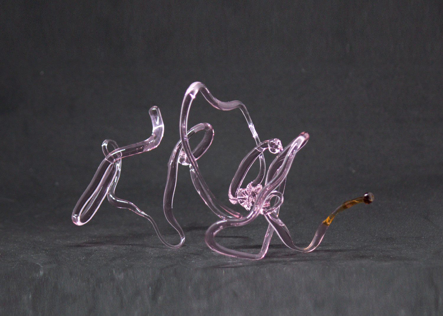 A Note to Myself (view 1) Clear pink borosilicate clear glass, flame work Appr. L 5 x W 2 x D 3” Wholesale Price: $130
