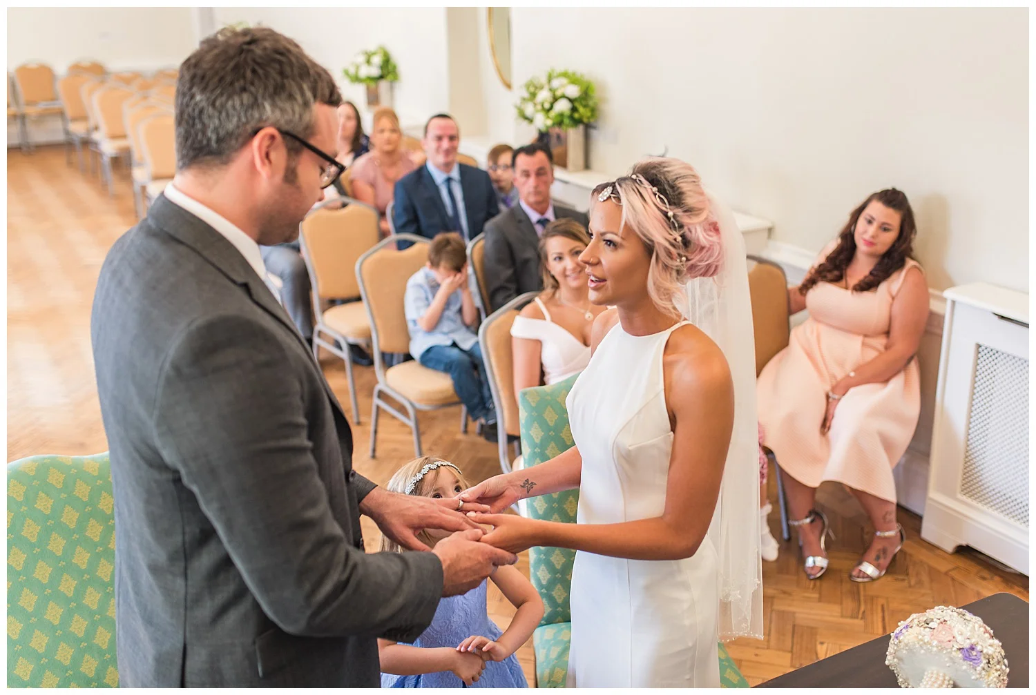 Exchanging wedding rings | York House Wedding Photography