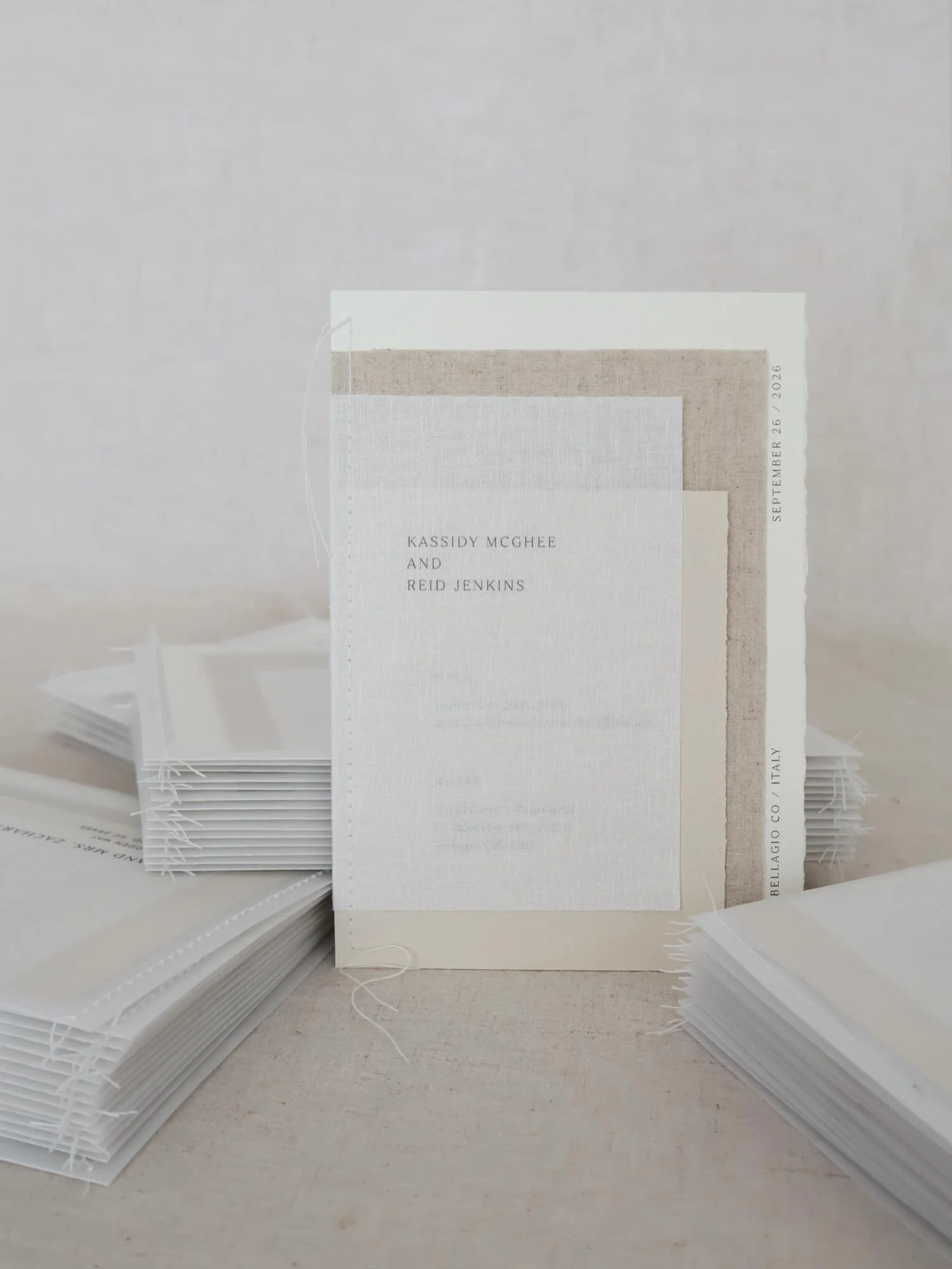 _
Layered linen invites with customized envelopes