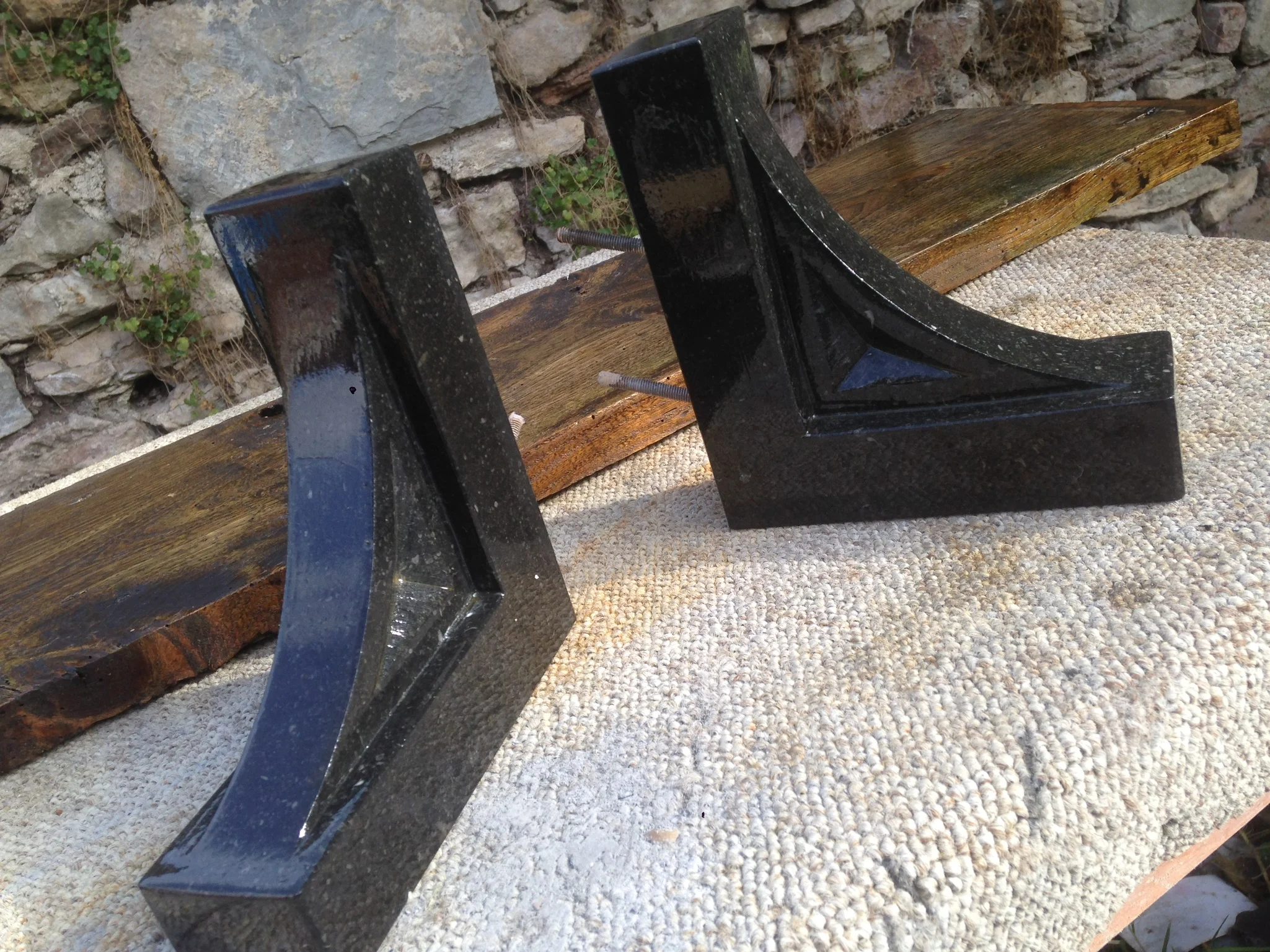 Black kilkenny limestone shelf brackets and elm shelf.