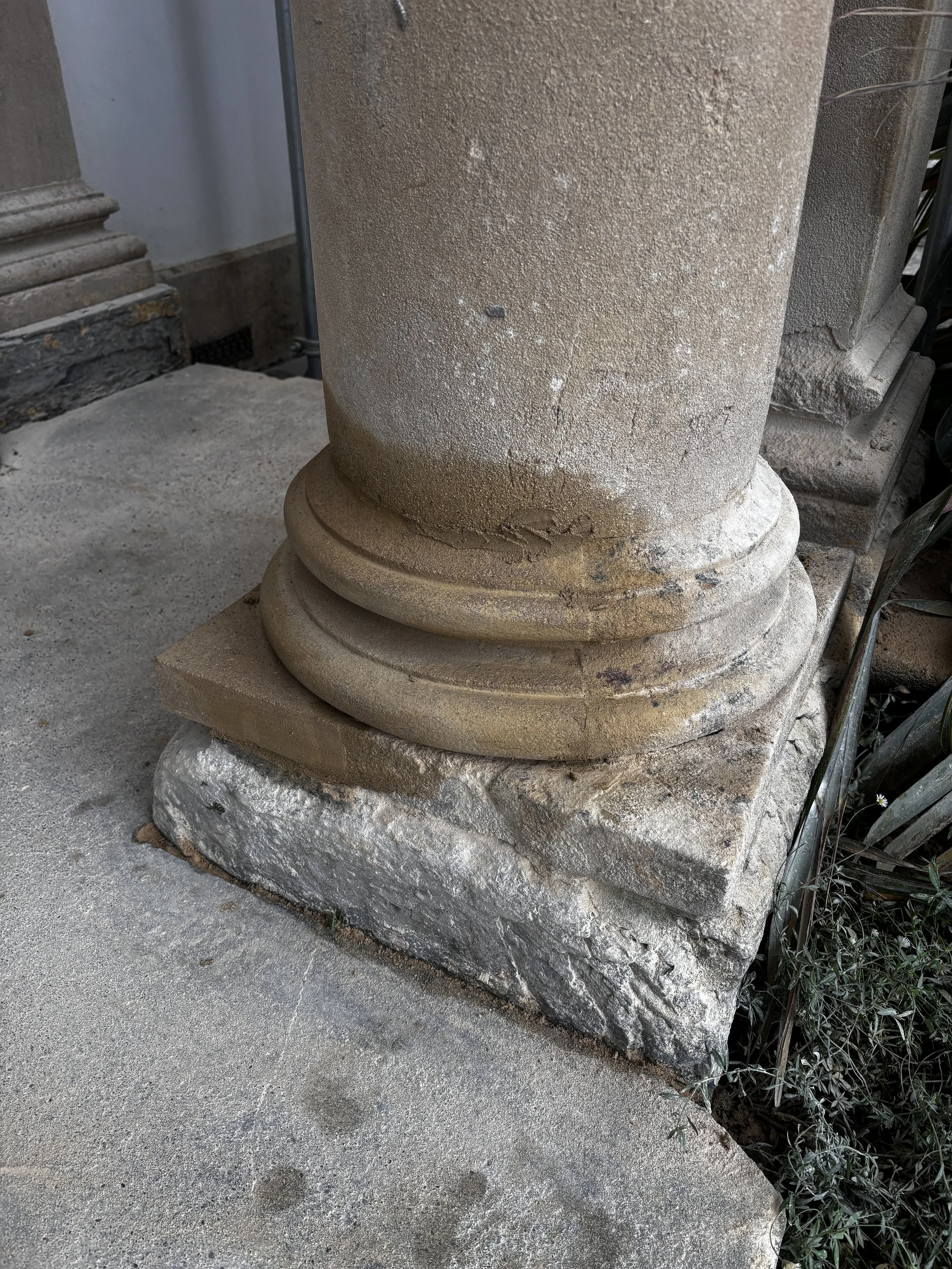 Large indent repair to Doulting stone Plinth
