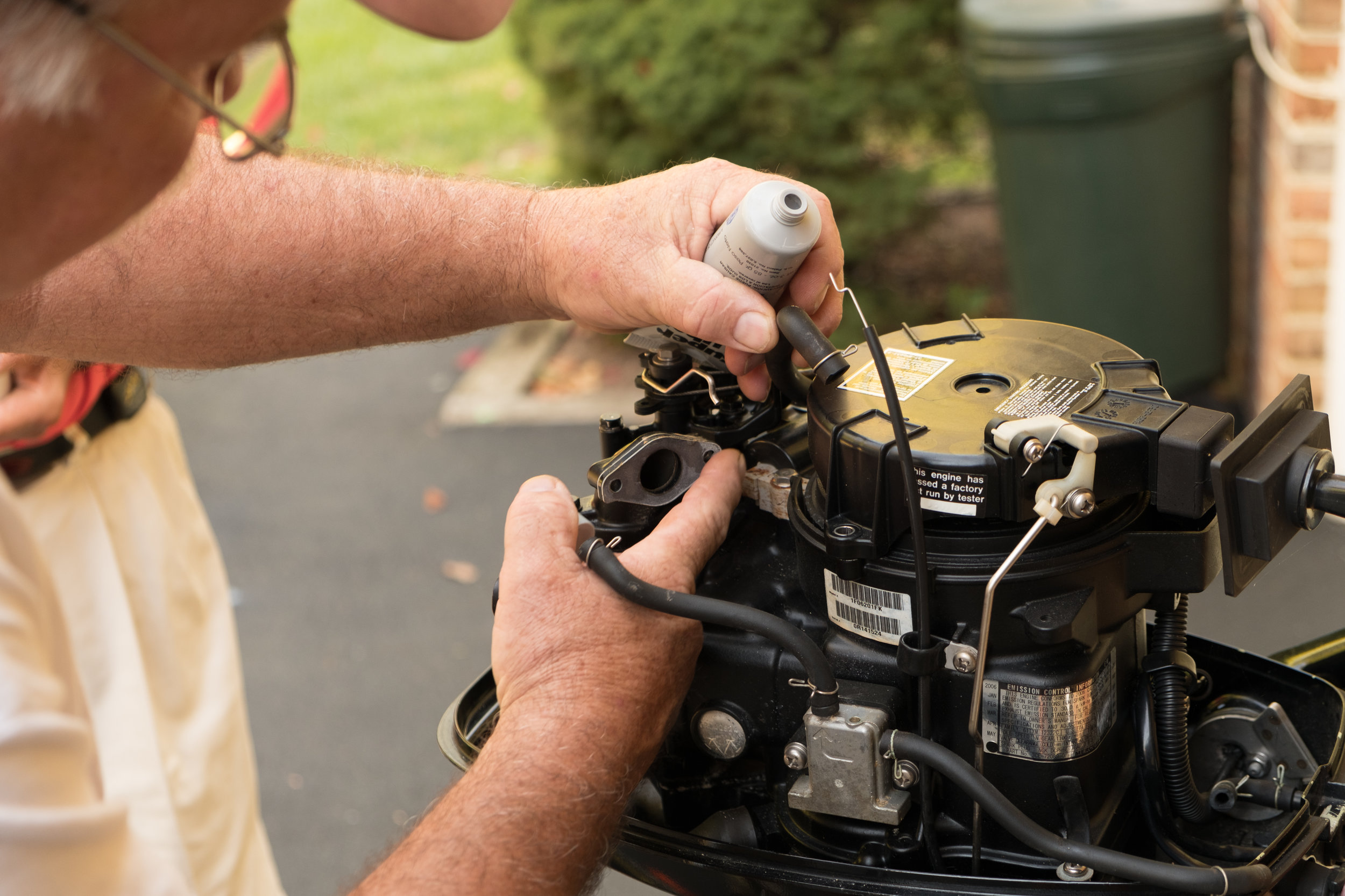 Will puts a thin layer of Super Lube on the carburetor gasket. before putting it all back together.