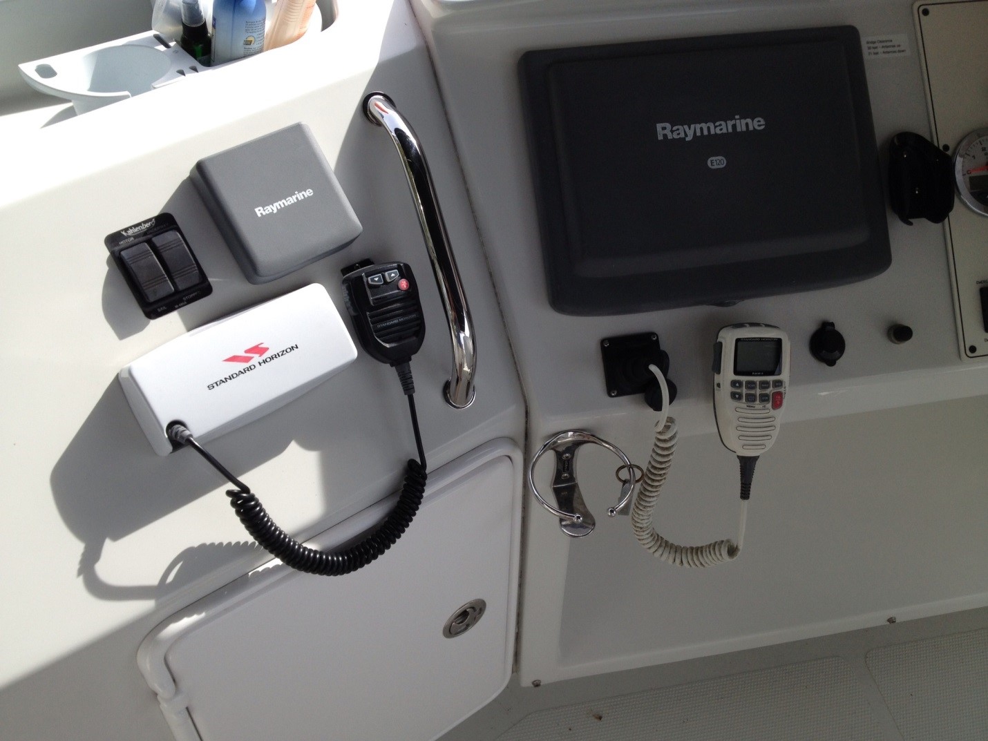 The two radios, dedicated depth sounder and Kahlenberg horn controls to the left of the helm chair. The flybridge helm is a great place to run the boat in all but extreme conditions. A new cover protects all of these electronics from the elements.