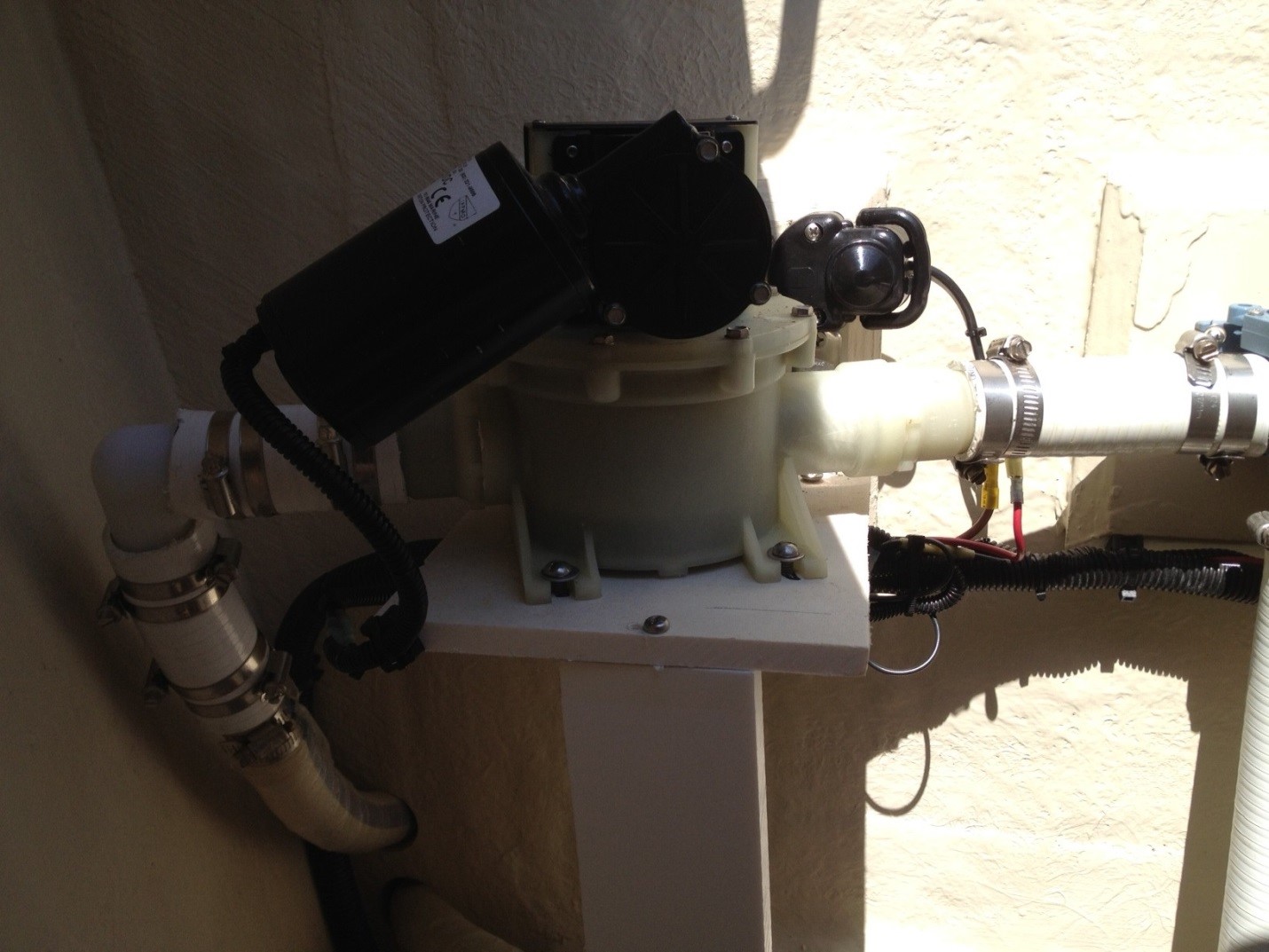 Details of the Sealand diaphragm pump for the guest holding tank. It is a much better system than the original Jabsco macerator pump, which is prone to failure and which PDQ owners regularly replace.