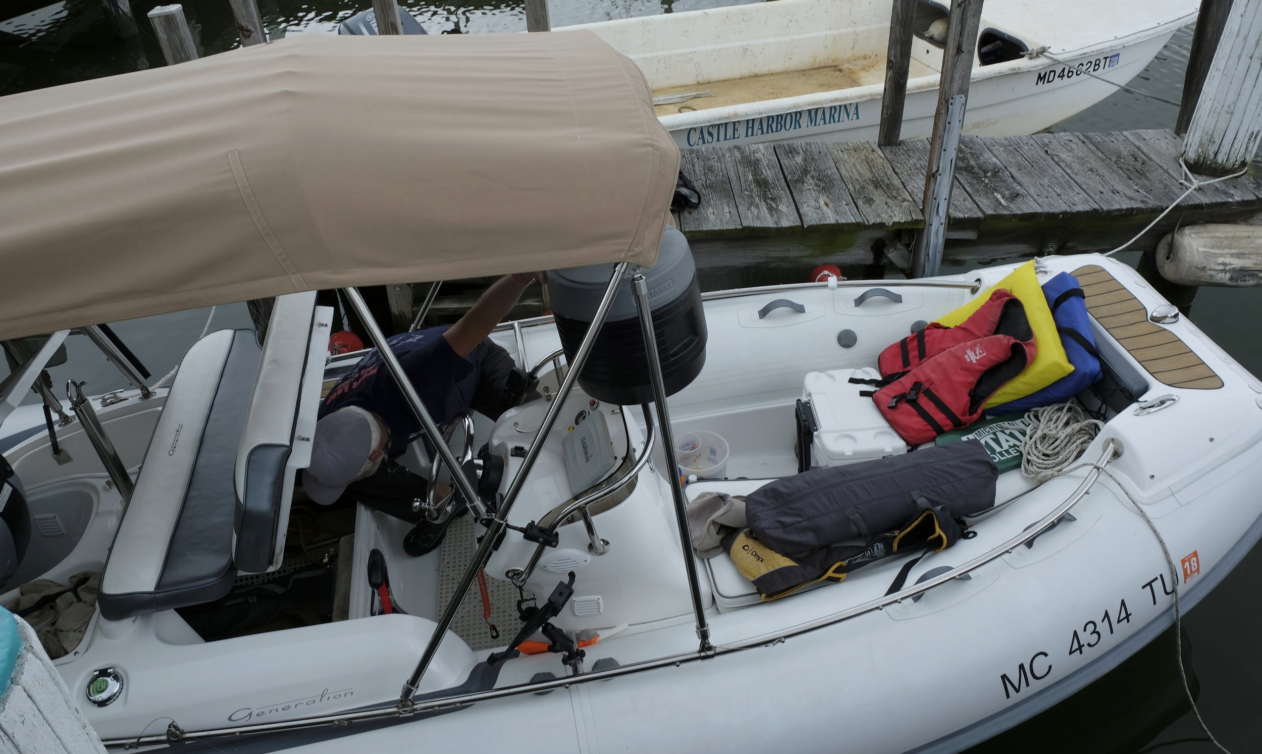 Lift the seat reveals a cavern of storage. Dave pulled out his tent, portable toilet, and all sorts of boating/camping gear. Amazing little boat.