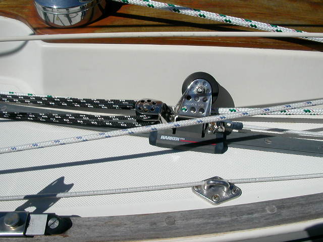 Being able to adjust the headsail blocks from the cockpit is much safer then sending crew forward.