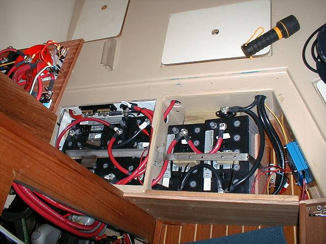 These batteries and wiring are good to go, well secured yet accessible.
