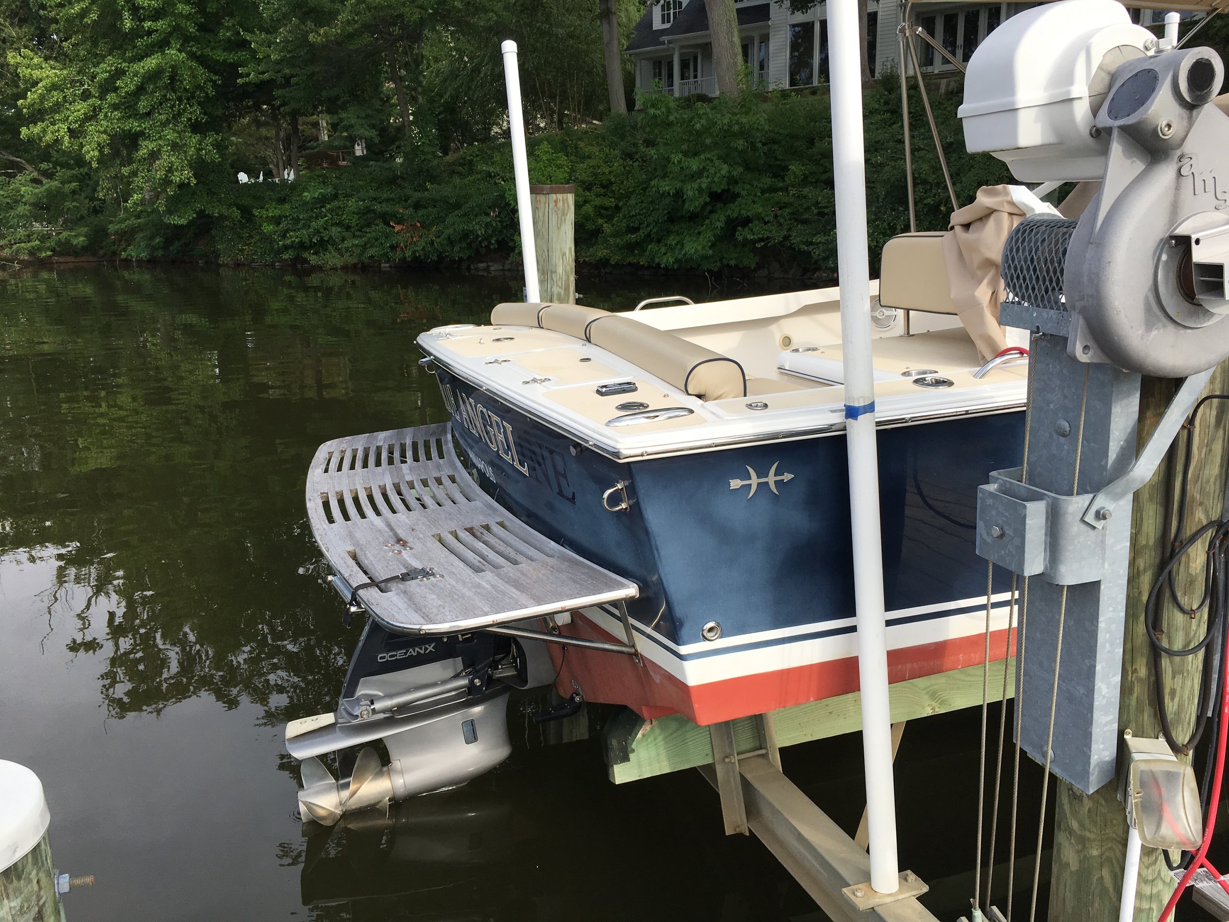 The stern area of the boat looks pretty sad, and it is more than a little embarrassing when we dock in public. It was under control until this summer, so we decided to schedule a professional paint job. And have it done right.