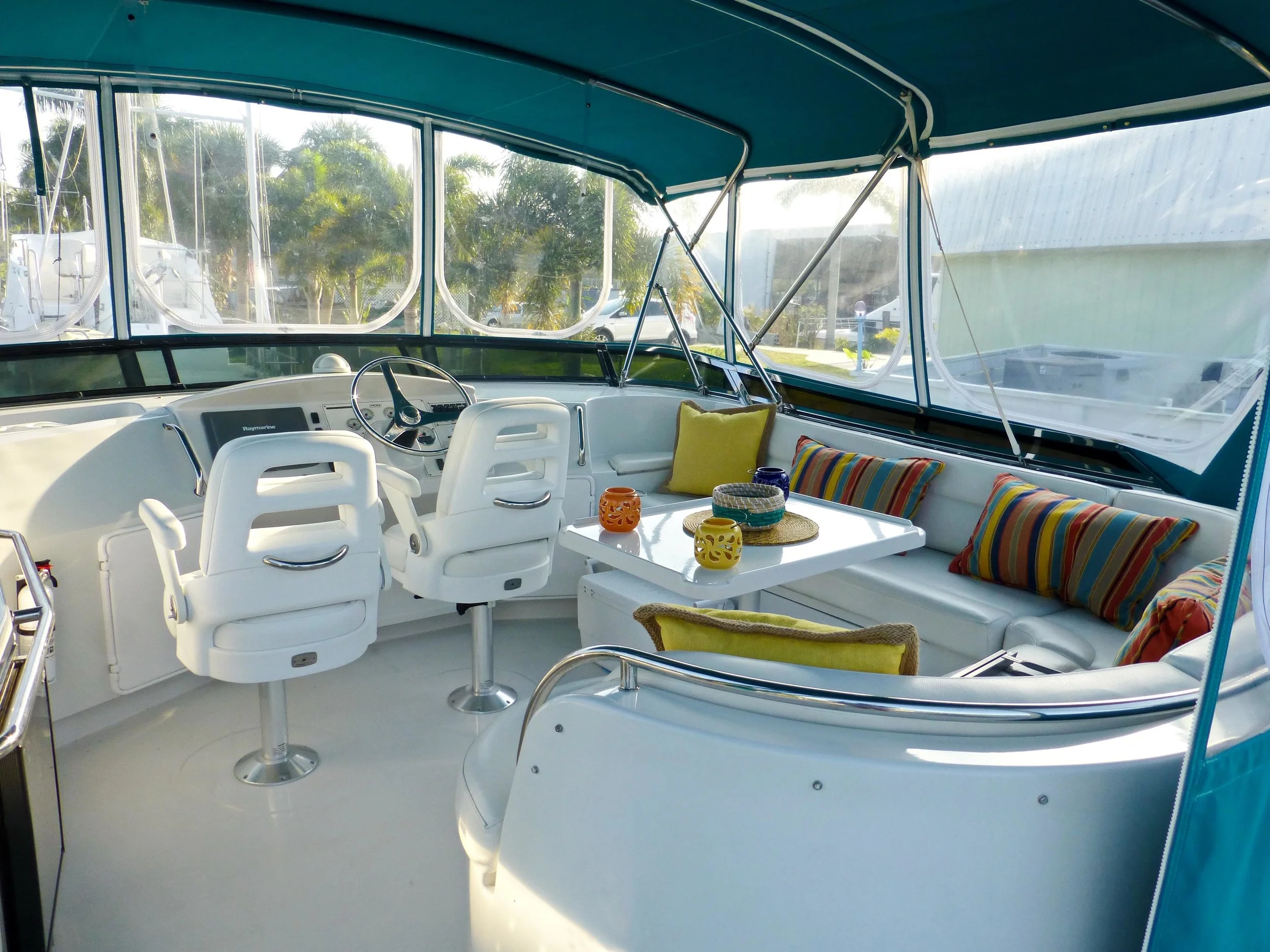 The flybridge on a sistership to Spitfire , our PDQ 41 power catamaran, shows its many cushions, which are backed with a coated mesh that can develop mildew over time. With X-14, this is entirely managebale.