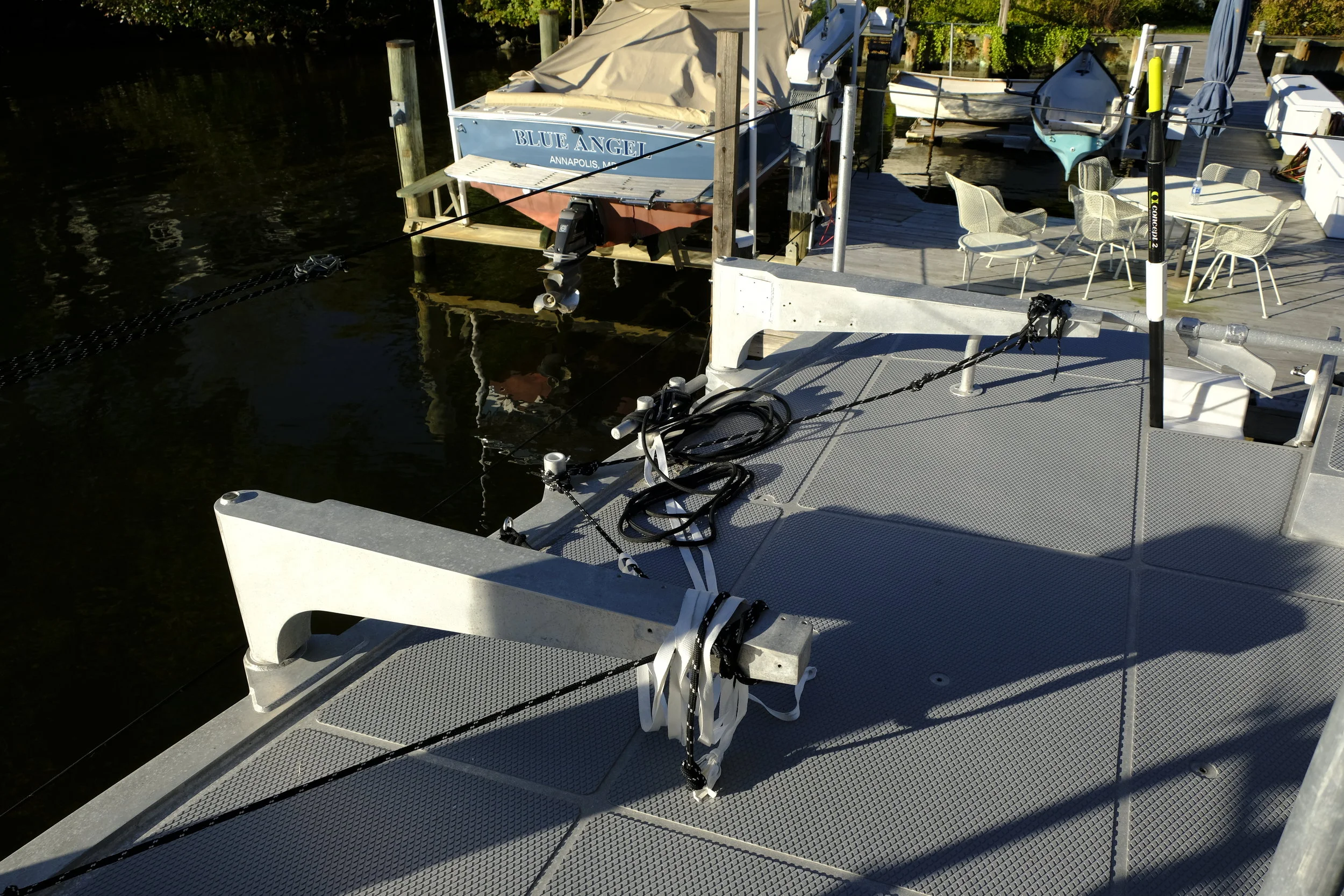The cradle arms for the RIB swing out to hold the dinghy off the side of the boat, creating a large social area on the aft deck.