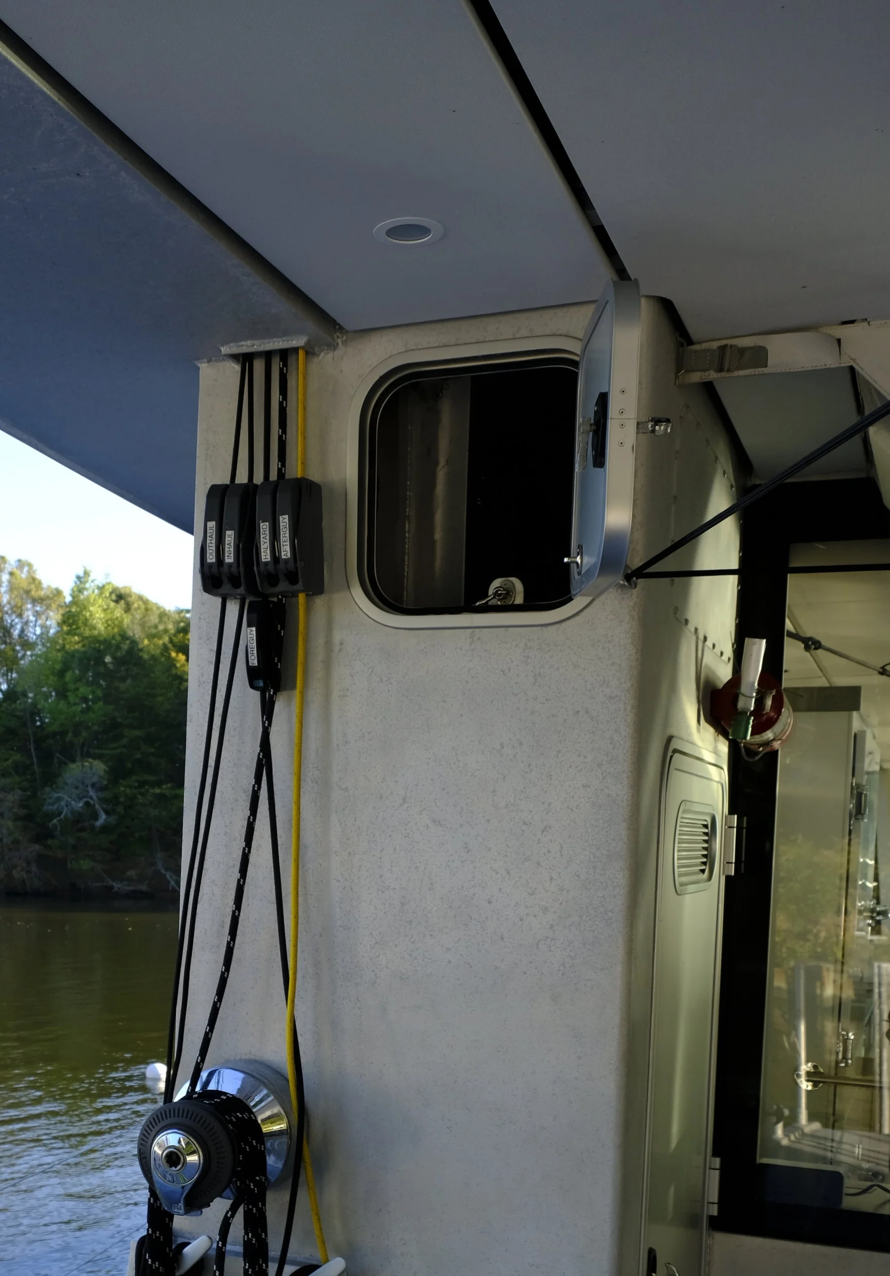 Behind this door are two, 14-inch Delta T exhaust fans to really pull air out of the galley and saloon. It is a great way to keep the interior well ventilated, lowering the need for constant air conditioning, as well as keeping odors out of the boat. These fans and the boat's opening ports do a great job of keeping the interior cool and fresh.
