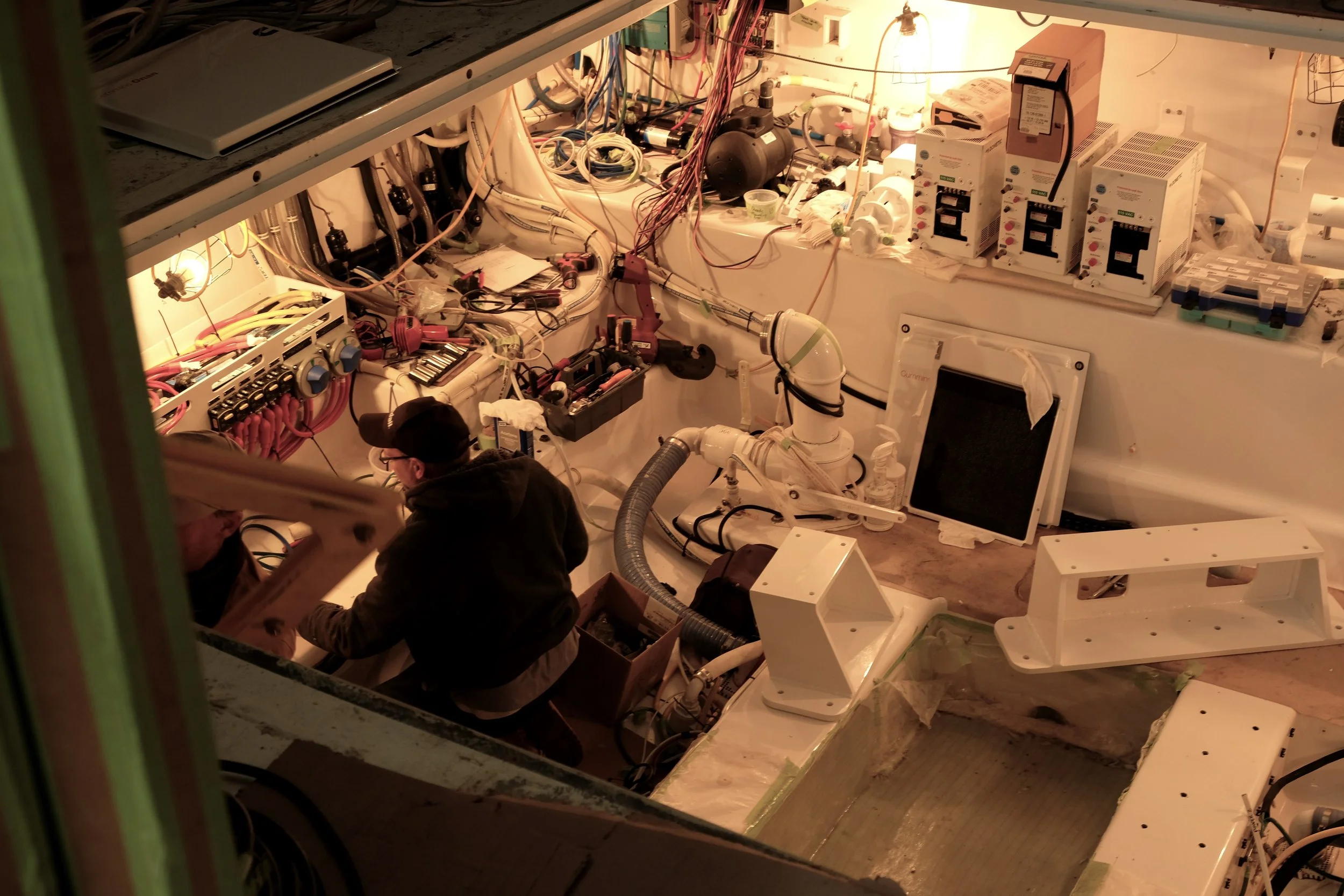 It was vital that all electrical and plumbing work be completed in the engine room before the generator and engines went in, as this seemingly open space becomes very tight with all machinery installed. The workmanship is first class.