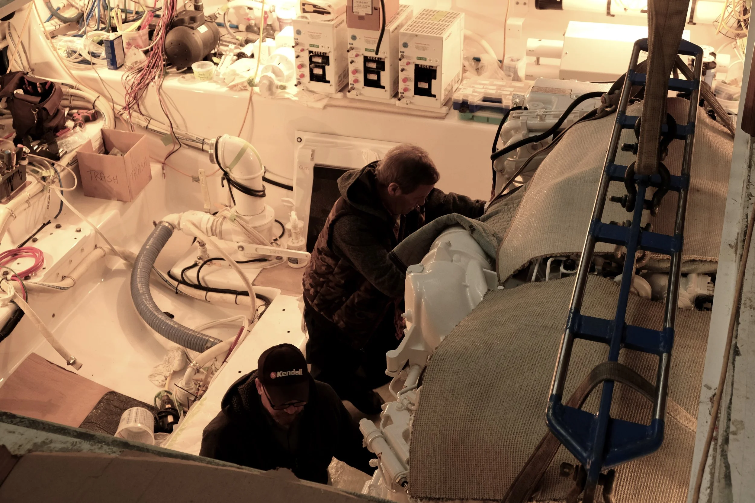 Almost done, the techs put Tef-Gel on all engine mounting bolts as the starboard MTU becomes part of the new yacht. These diesels will drive the 74-footer to 48 knots.