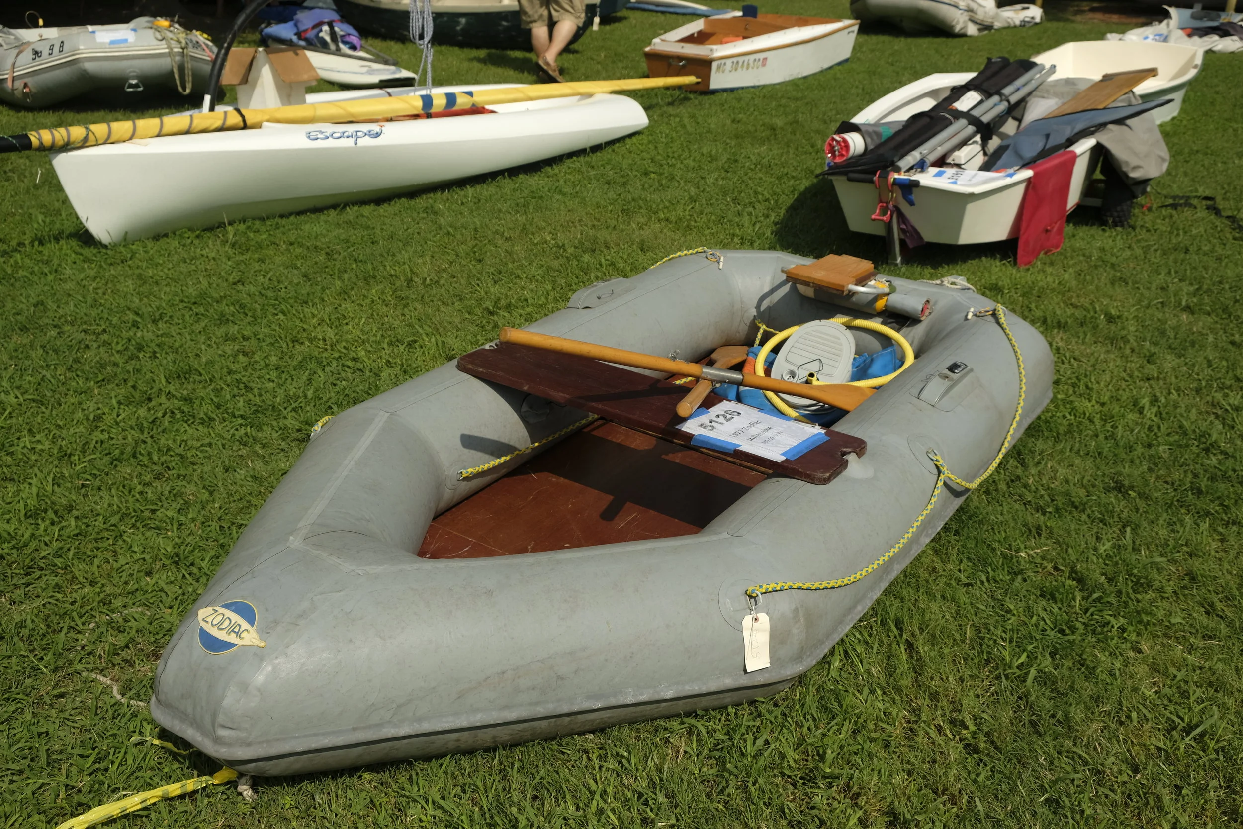 What would you pay for a 1977 Zodiac inflatable? Who would keep such a thing around? Almost as crazy as last year's engine guy selling old outboards. Buy a British Seagull and get a second Seagull for free. I kid you not.