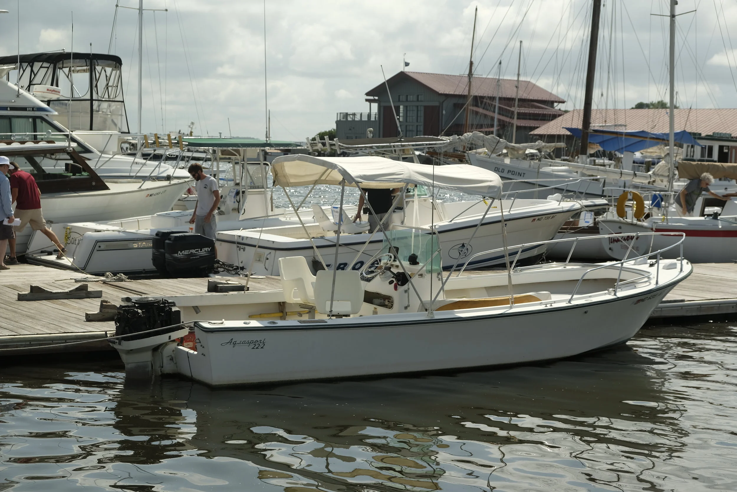 A tired Aquasport 22-foot center console could be a good project for someone.