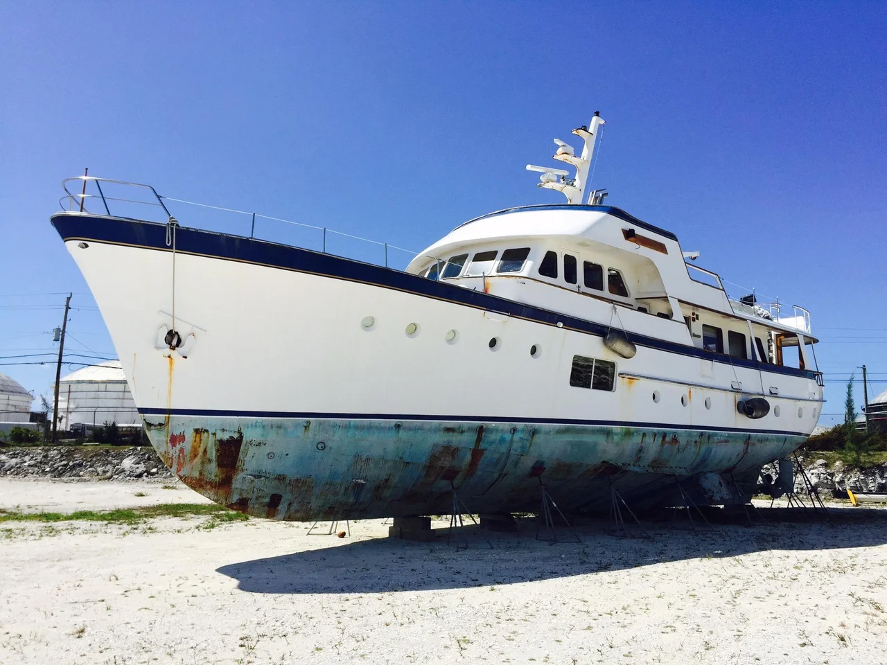 This 1964 Feadship canoe stern motoryacht would make a super home if lowered into the ground to its waterline and connected to city services. Just look at the interior pictures. Its superb interior rivals any million-dollar mansion. Eventually remove engines, tanks, and other nautical elements no longer necessary and one finds even more space for other comforts and accommodations. A 600-bottle wine cellar in the engine room! A unique residence one could be proud of. Keep the anchor for a distinctly nautical touch.