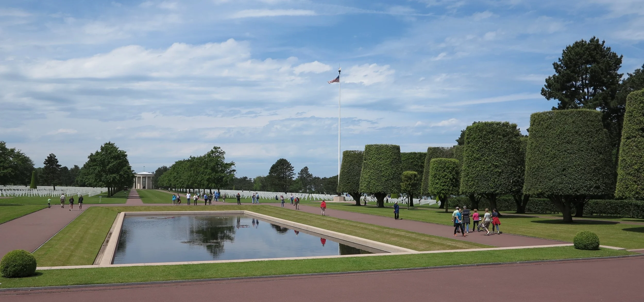 The Normandy American Cemetery in France is a quiet, meticulously maintained memorial that highlights the French reverence for all it represents, and the lives buried here. French school children frequently arrive by bus to lay flowers on individual graves.