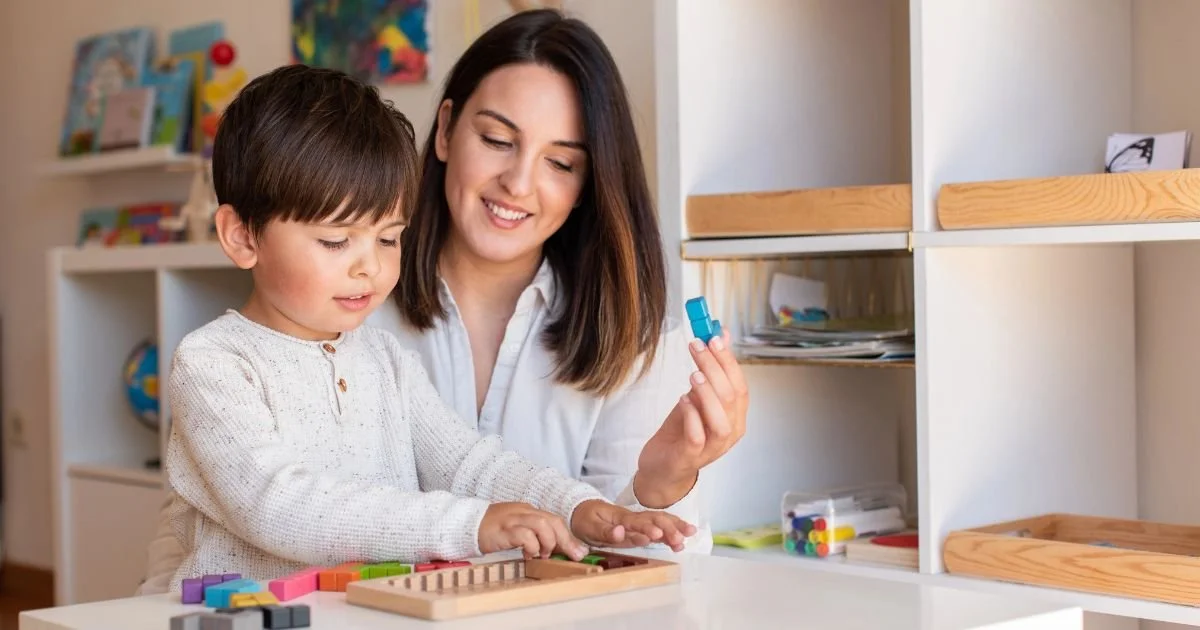 A mom and child who are Montessori homeschooling without expensive materials, using what they have already at home