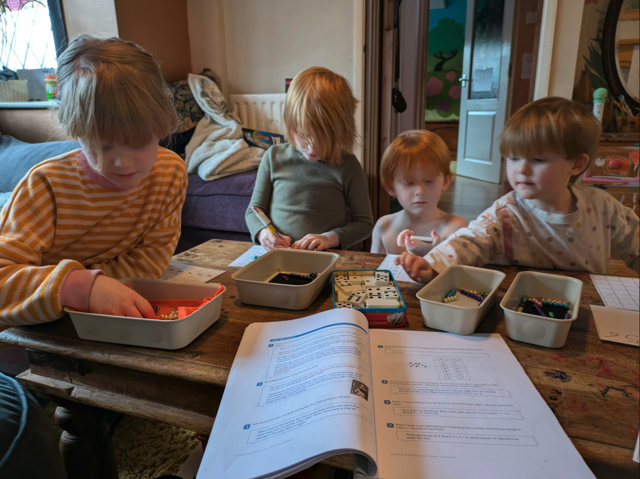 Homeschooling family learning math together