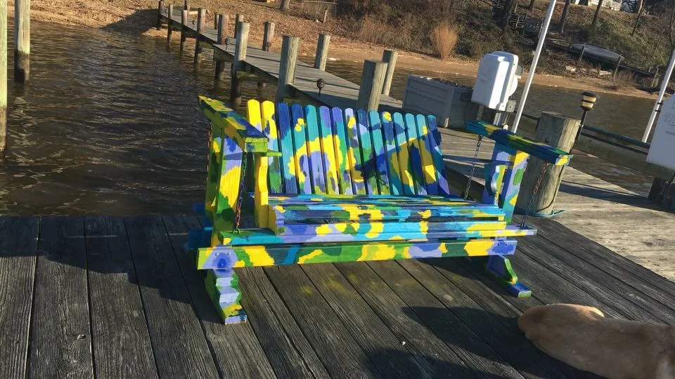 my dog napped in the sun while I painted this swinging bench