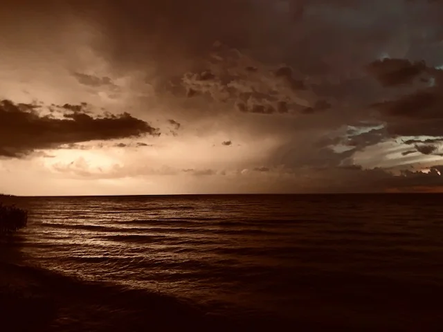 Big, booming, late summer lightning and thunder storms (Osicecas) illuminate Lake Michigan’s eastern shoreline.
