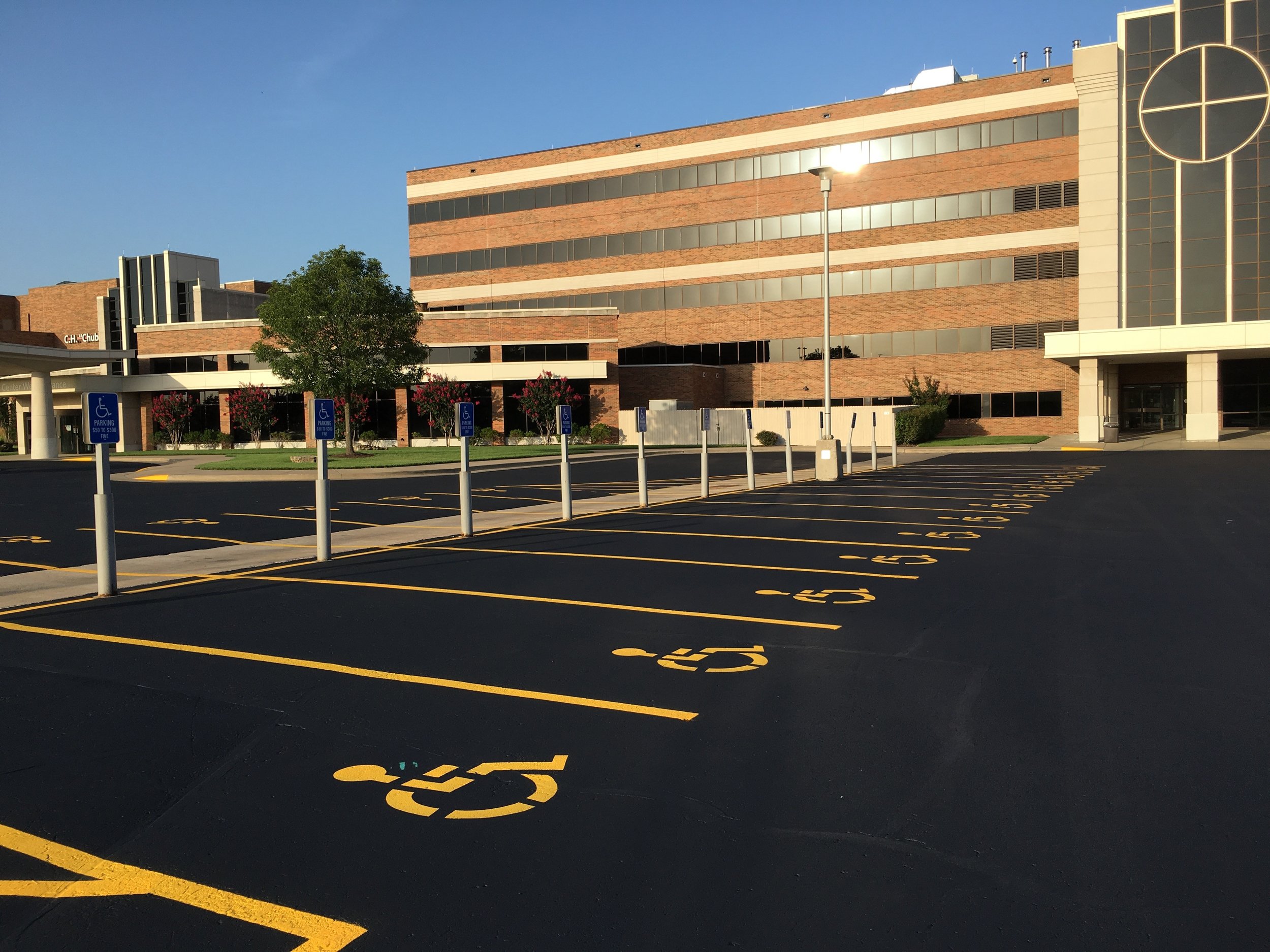 Close-up of the Smith Glenn Galloway parking lot marking application, featuring reflective paint for enhanced visibility, executed by Springfield Striping and Sealing in Springfield, Missouri.