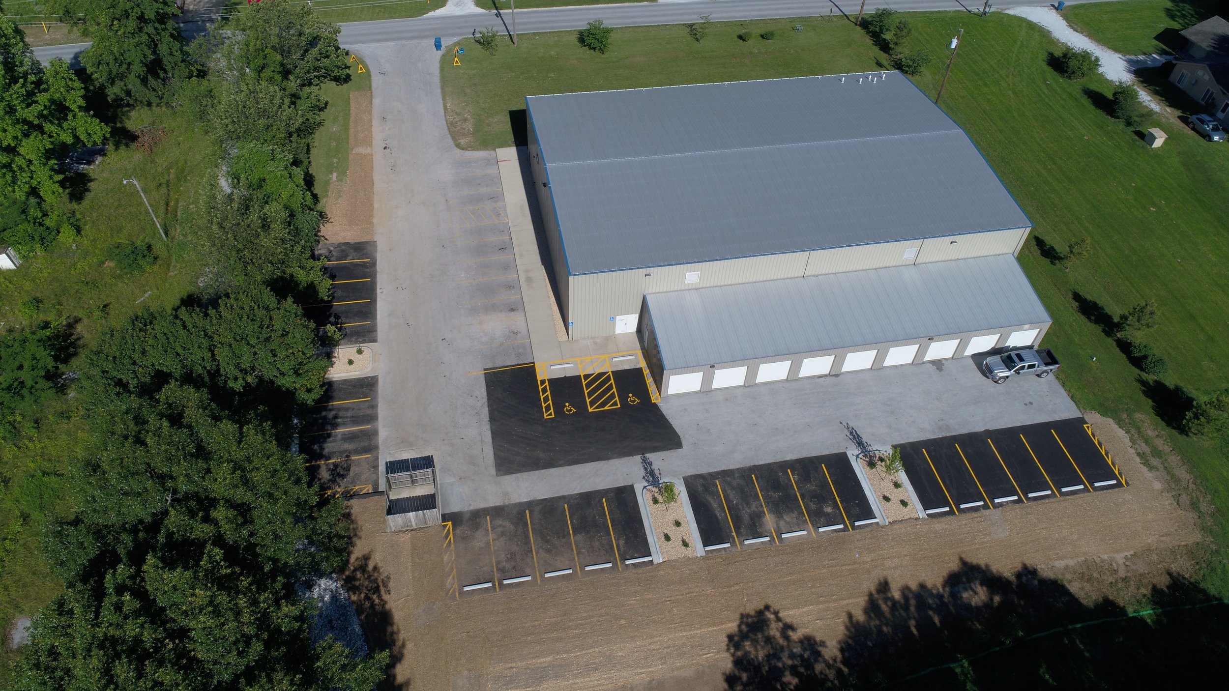 Overhead view of a newly striped and sealed parking lot by Springfield Striping &amp; Sealing, highlighting their precision work near Springfield, MO.