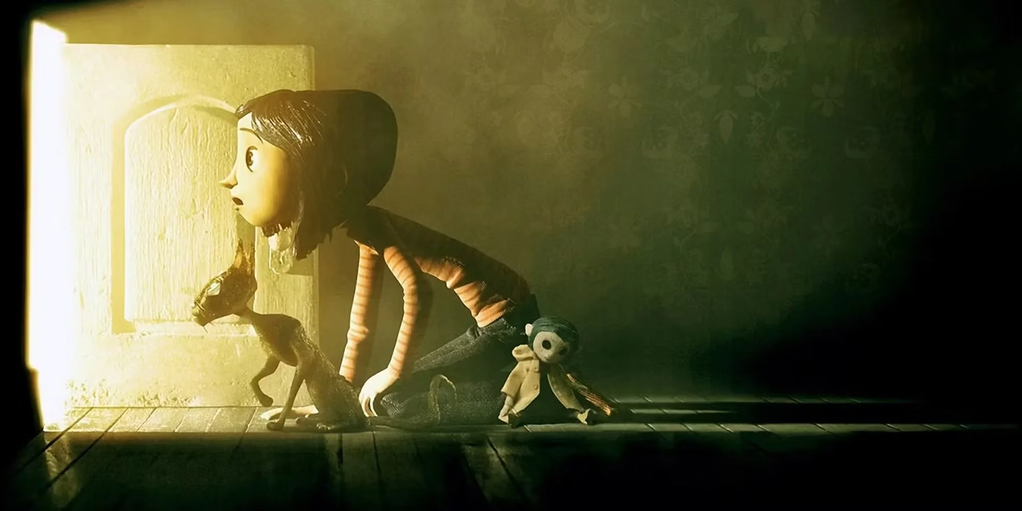 Coraline looking throught the door.jpeg
