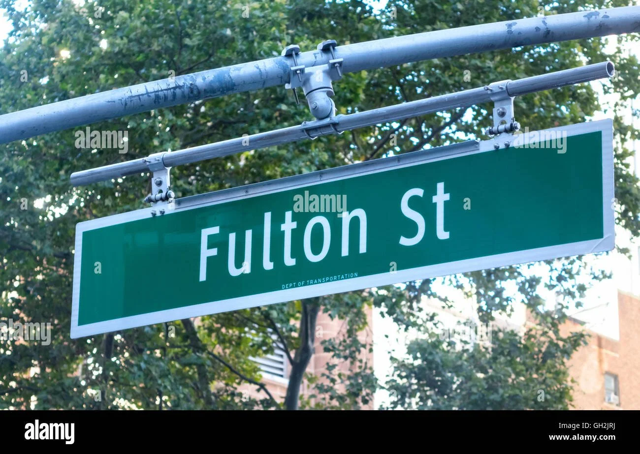 fulton-street-sign-at-broadway-in-the-wall-street-financial-district-GH2JRJ.jpg