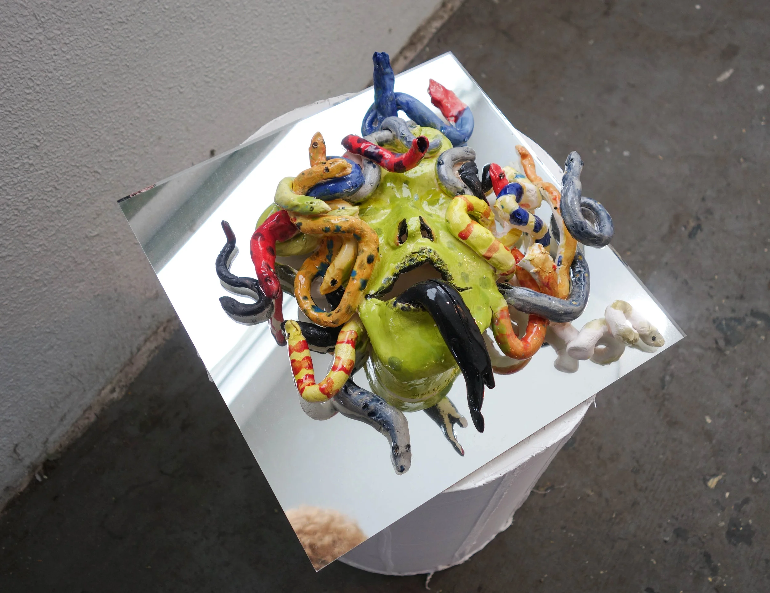 Molly Shea, "Hair today, Gorgon tomorrow", 2018. Dimensions variable. Ceramics, quick-tube column, & mirror.