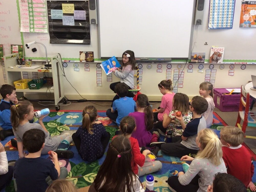 Bayla Siedband reading to 2nd grade Wilmette IL 2-18.JPG