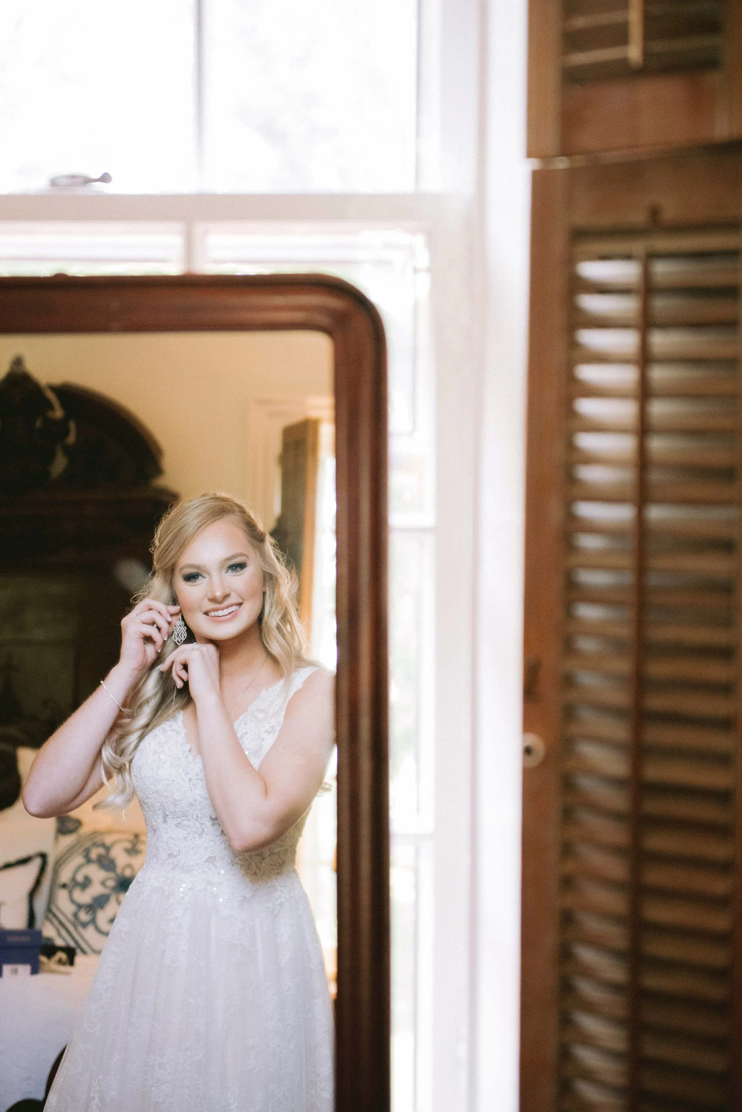  Bride getting dressed by Twila Allen of Twila’s Photography 