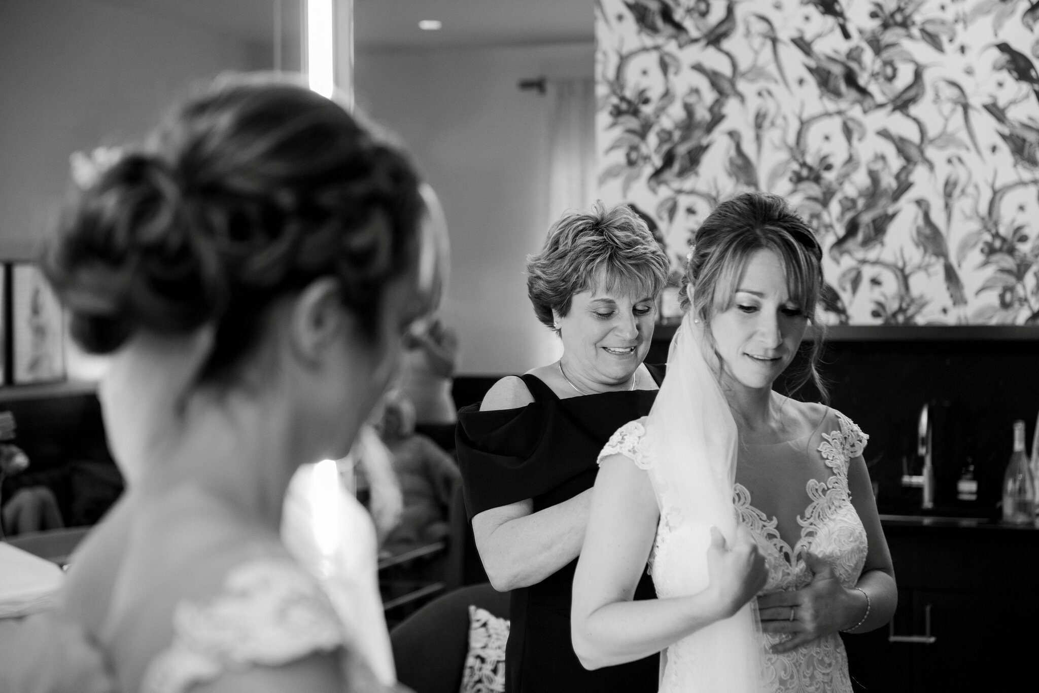 Candid getting ready moment at wedding