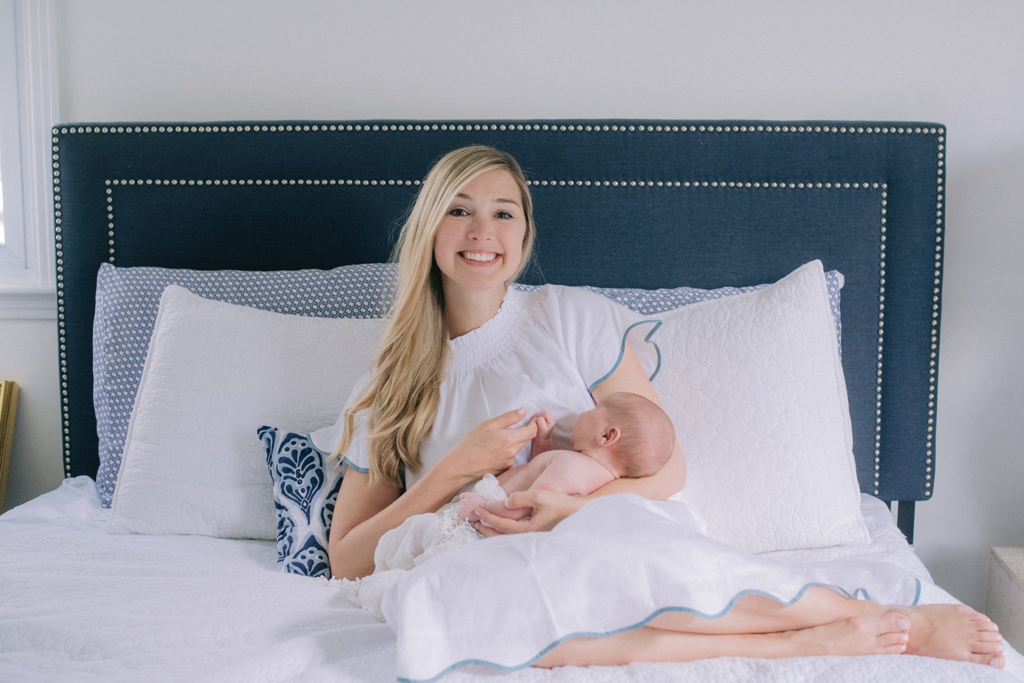 newborn photography in bed