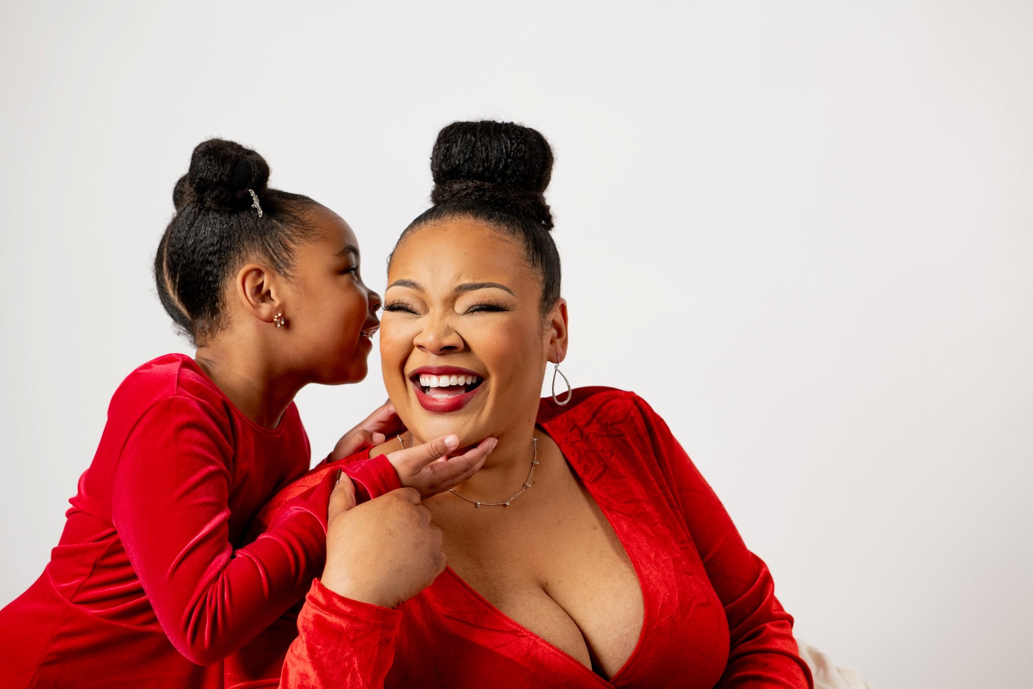 mother daughter laughing in studio session