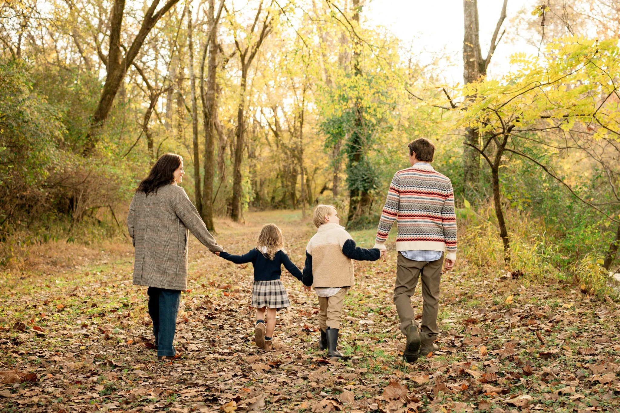 family walking together during photo shoot